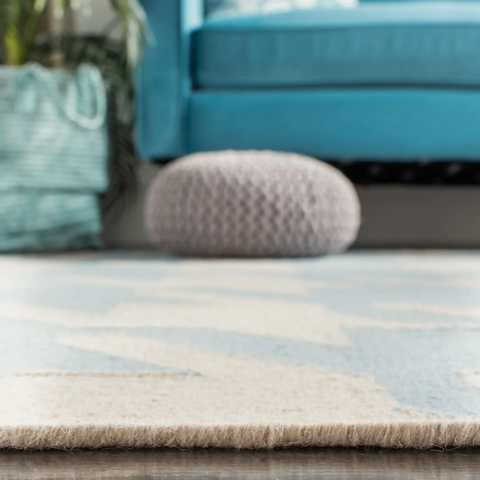 Dhurries Houndstooth Hand-Woven Wool Rug in Light Blue / Ivory in a styled room