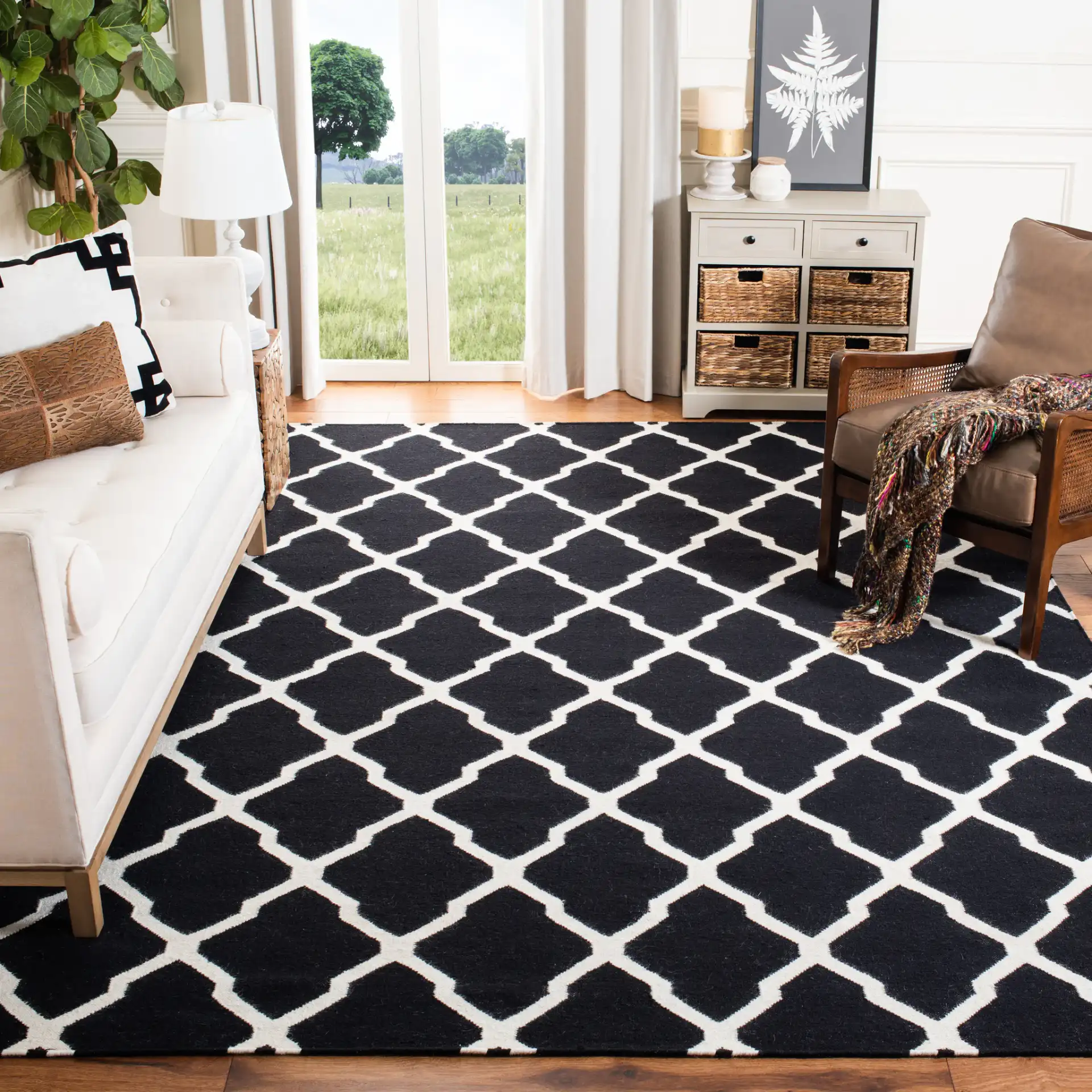 Dhurries Lattice Hand-Woven Wool Rug in Black / Ivory in a styled room