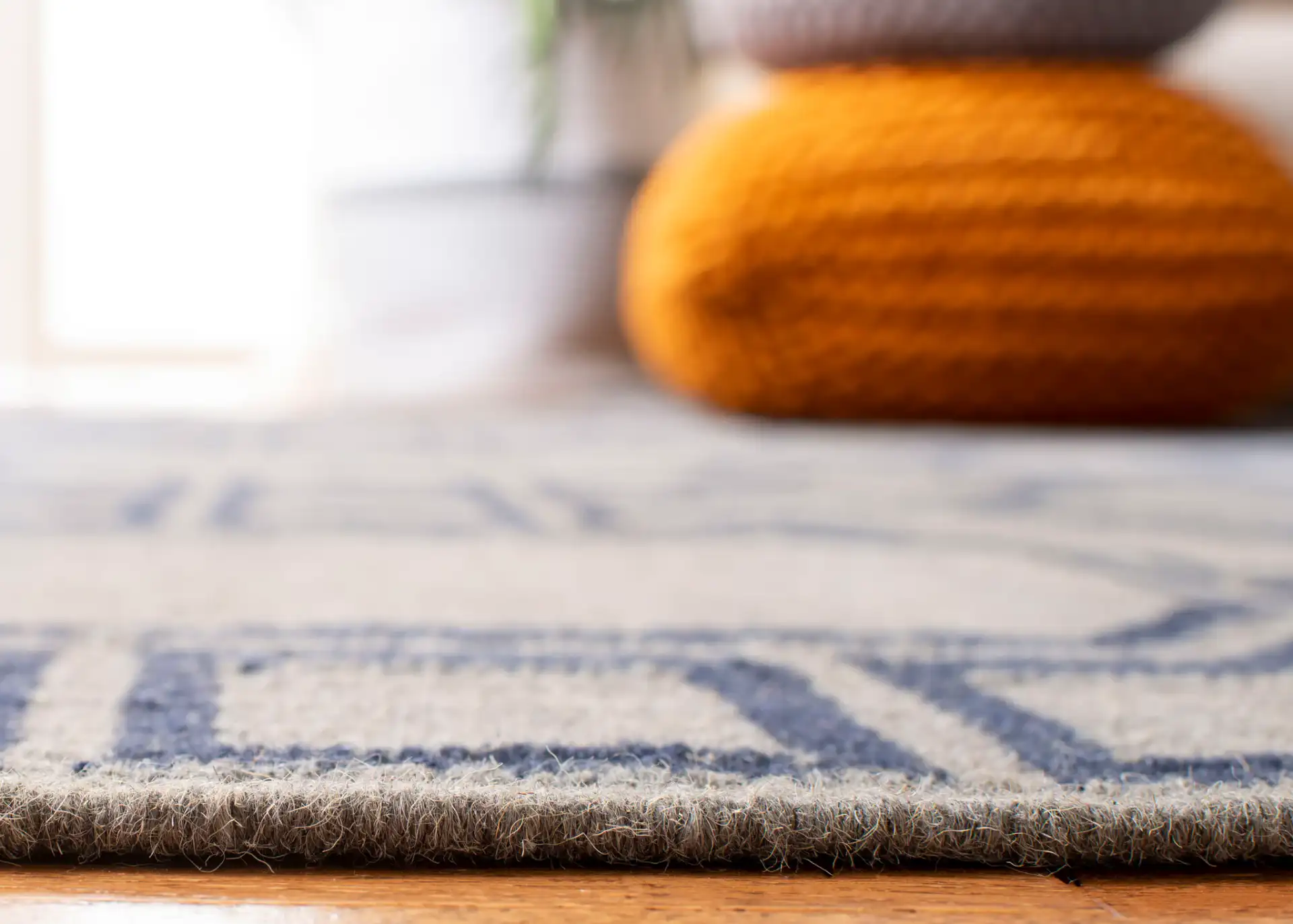 Dhurries Octagon Trellis Hand-Woven Wool Rug in Gray / Dark Blue in a styled room