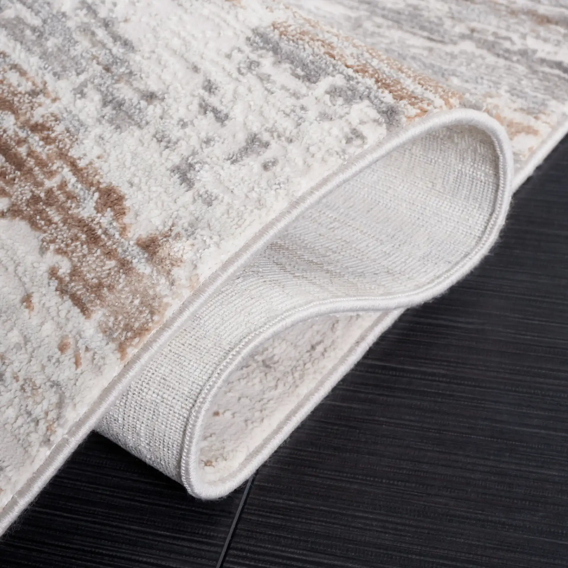 Diamond Striated Abstract Rug in Beige / Gray Brown in a styled room