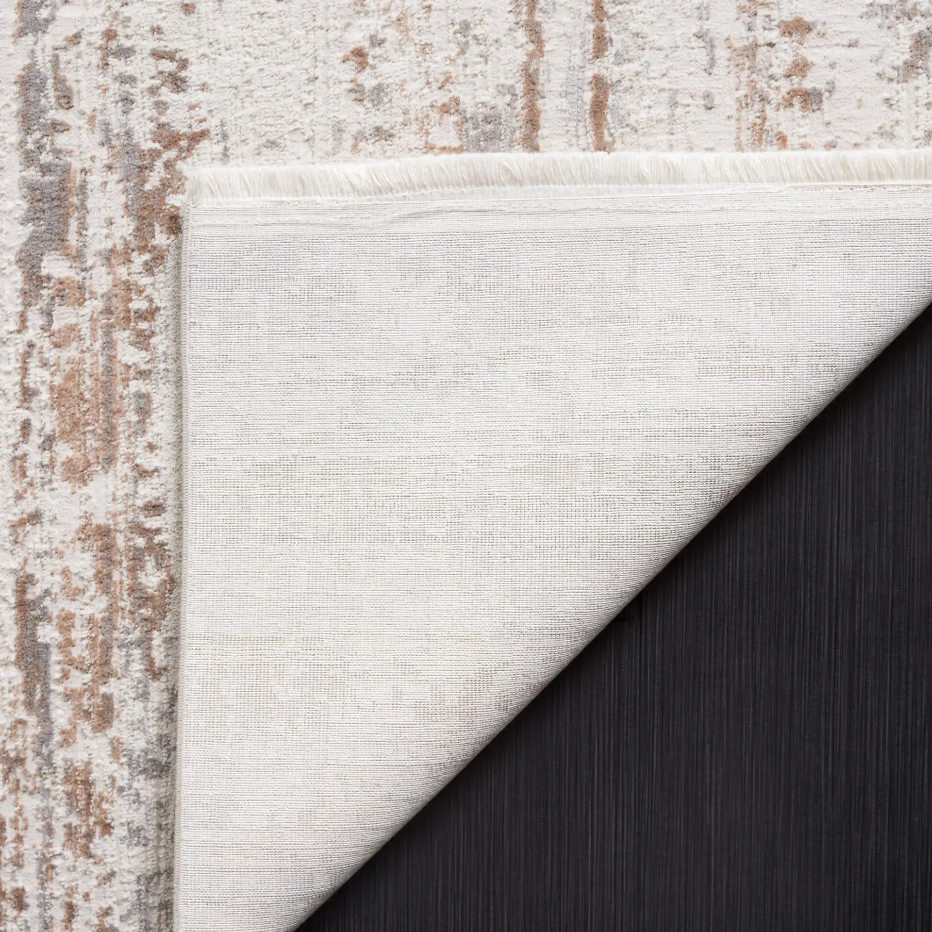 Diamond Striated Abstract Rug in Beige / Gray Brown in a styled room