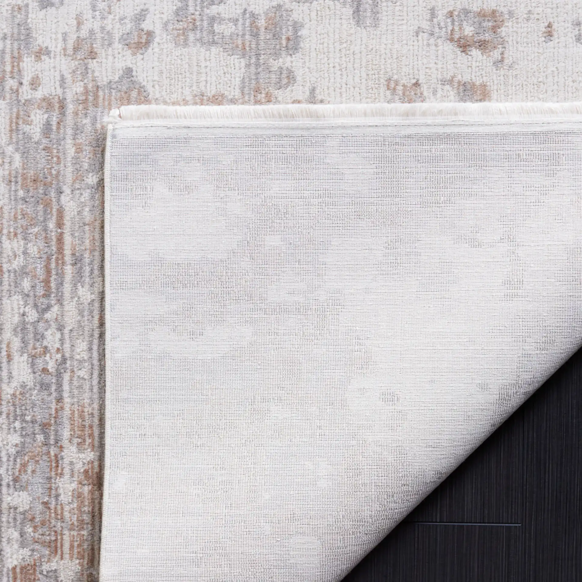Diamond Distressed Abstract Rug in Beige / Brown in a styled room