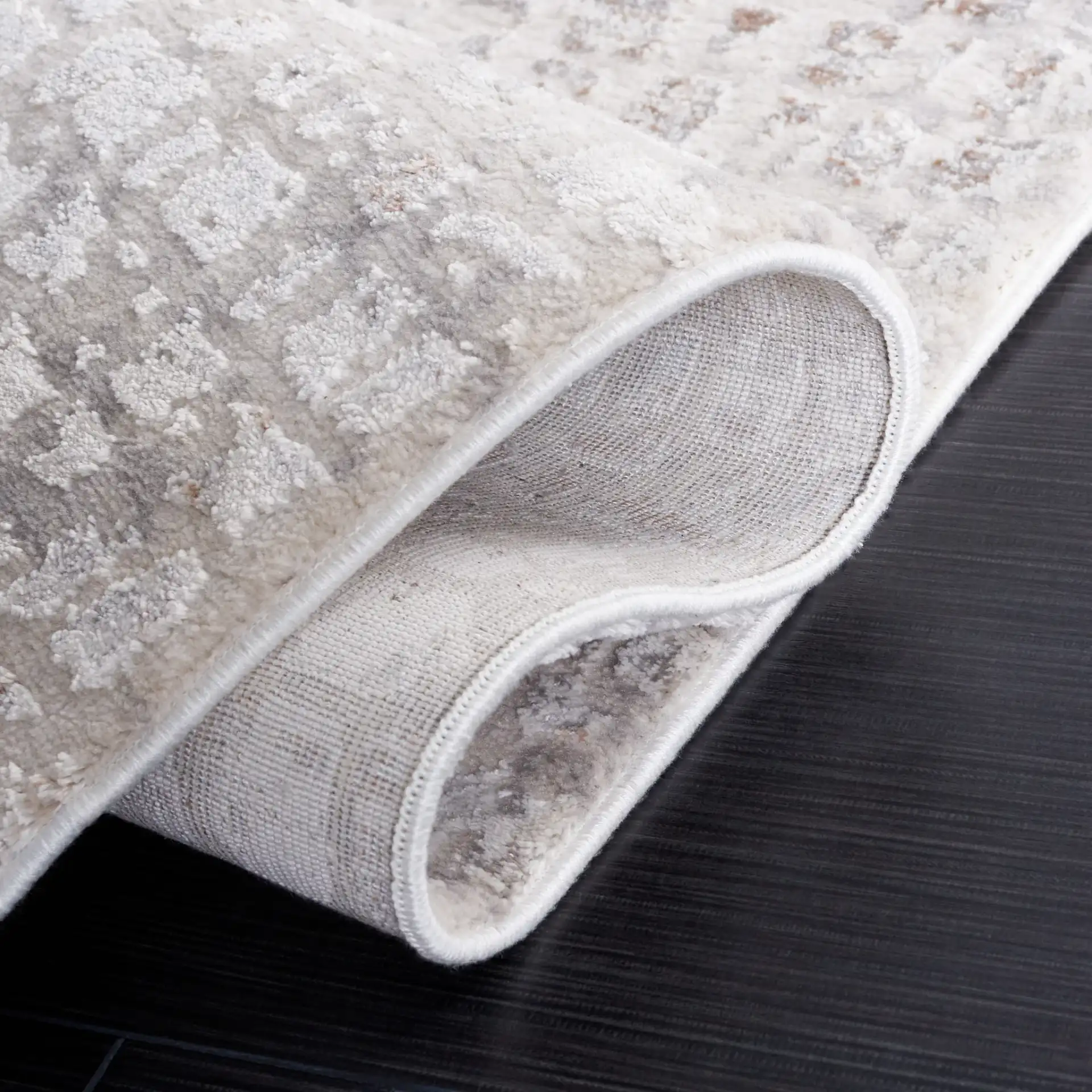 Diamond Distressed Grid Rug in Beige / Gray in a styled room