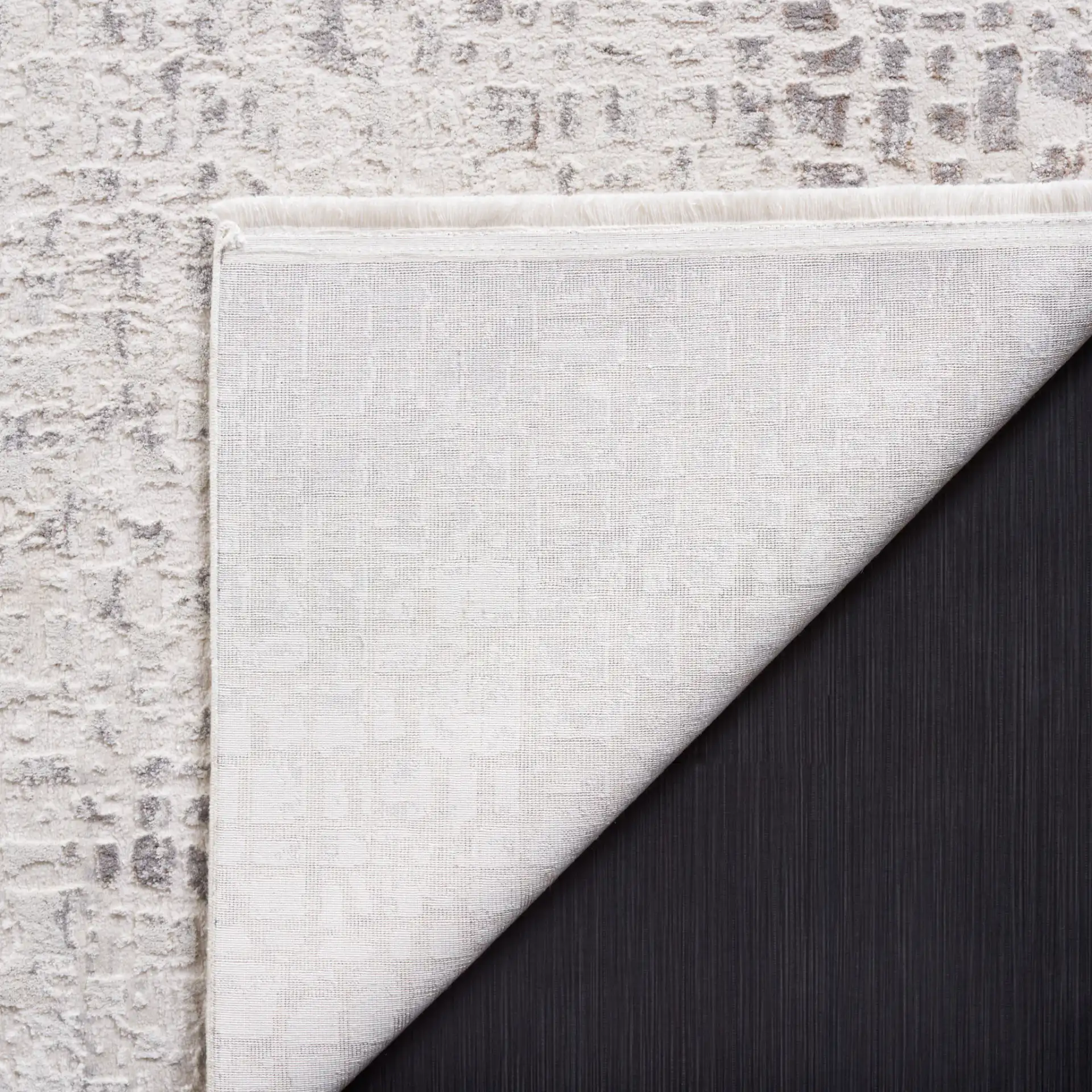 Diamond Distressed Grid Rug in Beige / Gray in a styled room