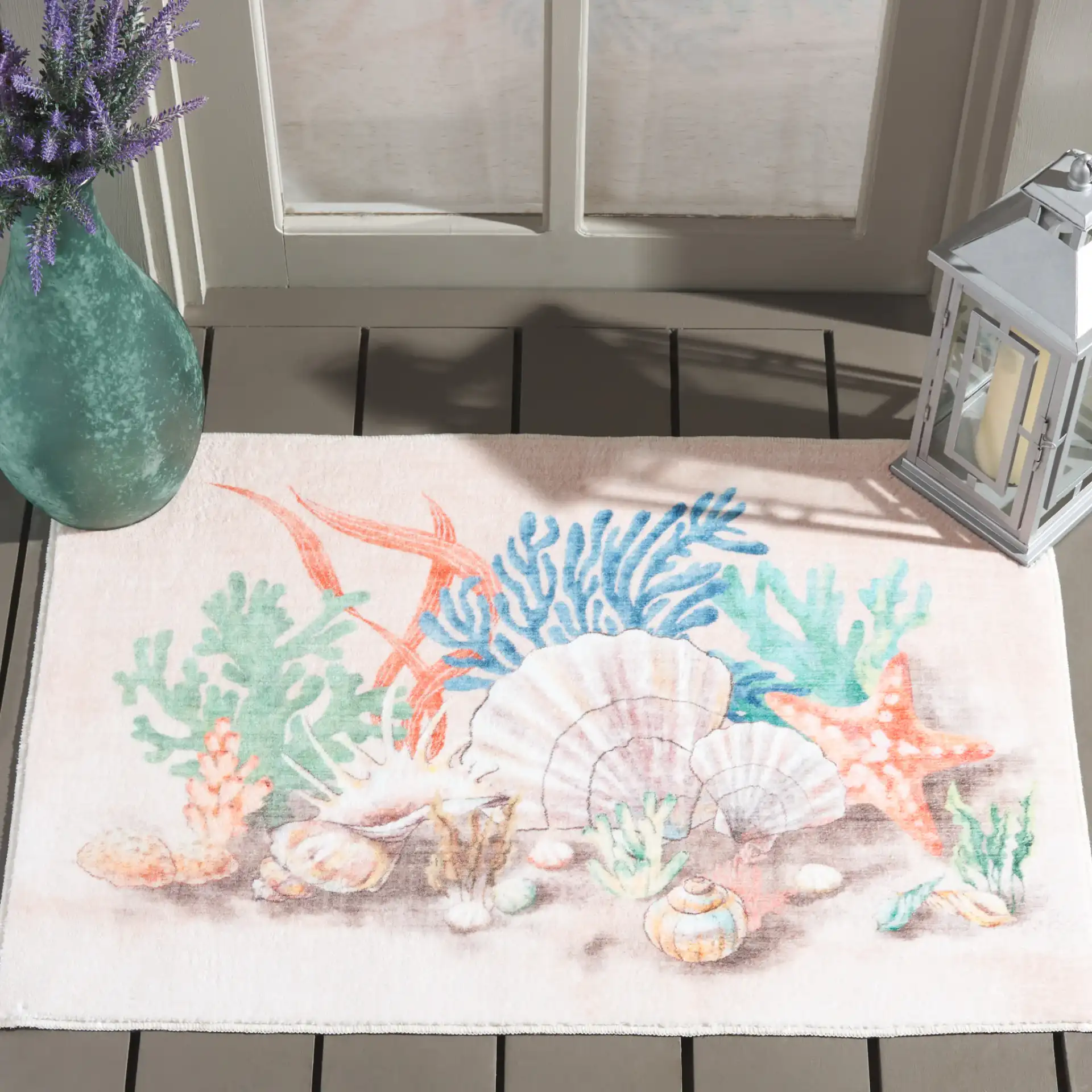 Seashell Washable Door & Kitchen Mat in Peach / Green in a styled room