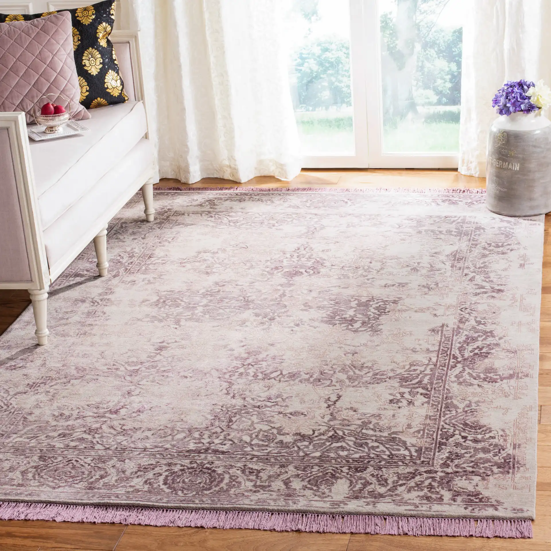 Dream Distressed Botanical Border Hand-Knotted Rug in Dream Distressed Botanical Border Hand-Knotted Rug in a styled room