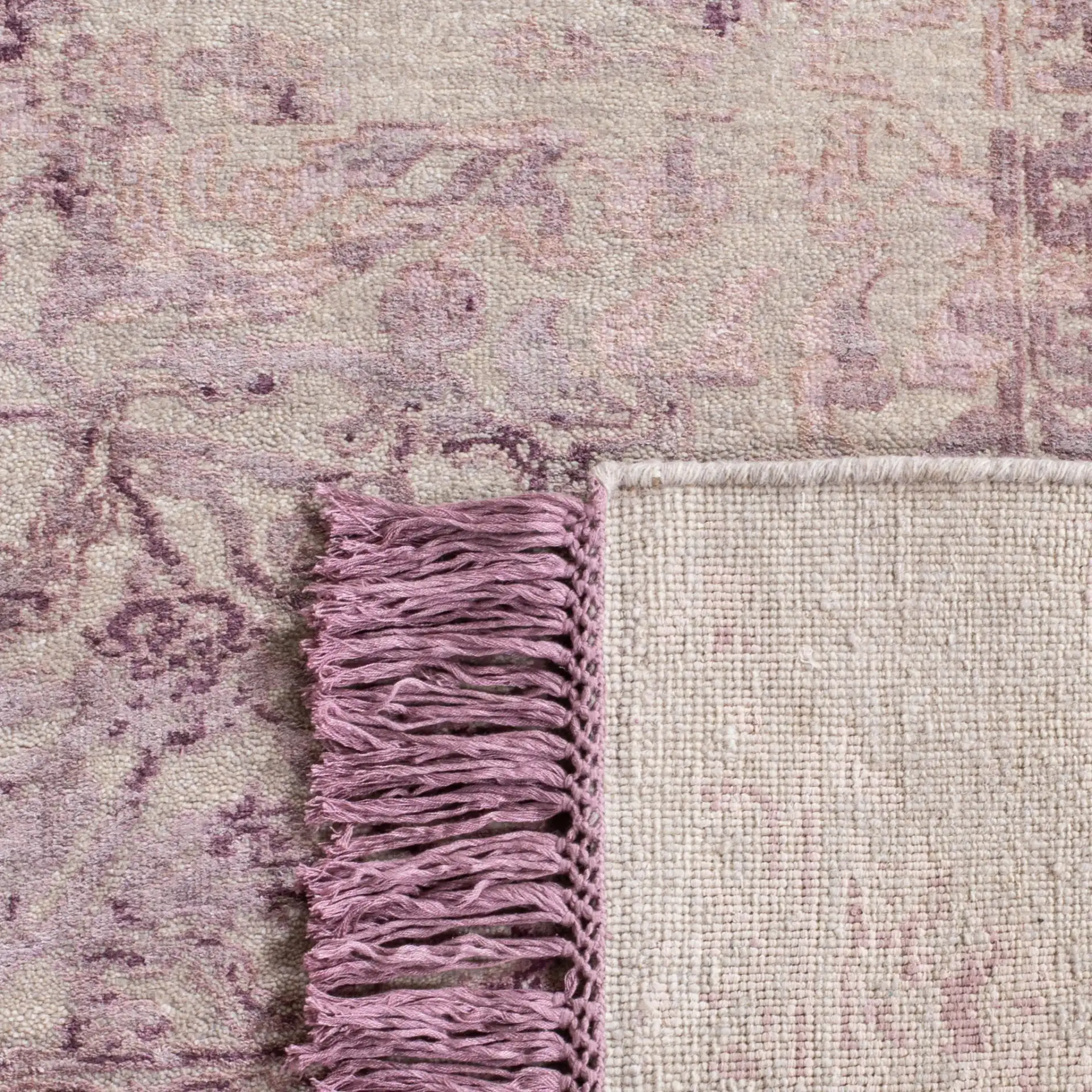 Dream Distressed Botanical Border Hand-Knotted Rug in Dream Distressed Botanical Border Hand-Knotted Rug in a styled room