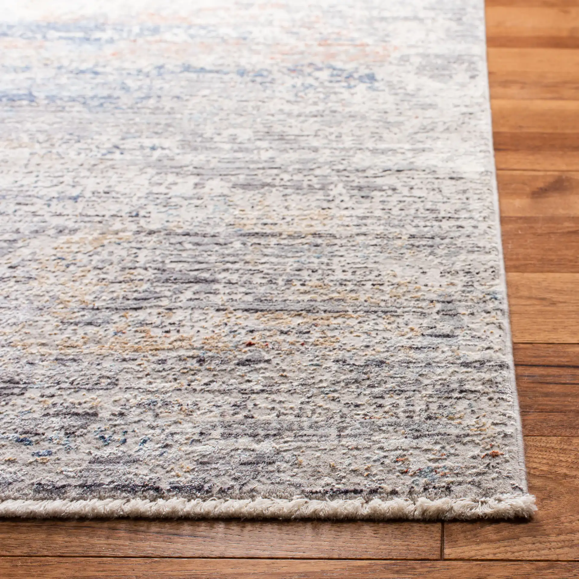 Dream Abstract Stripe Rug in Gray / Blue in a styled room