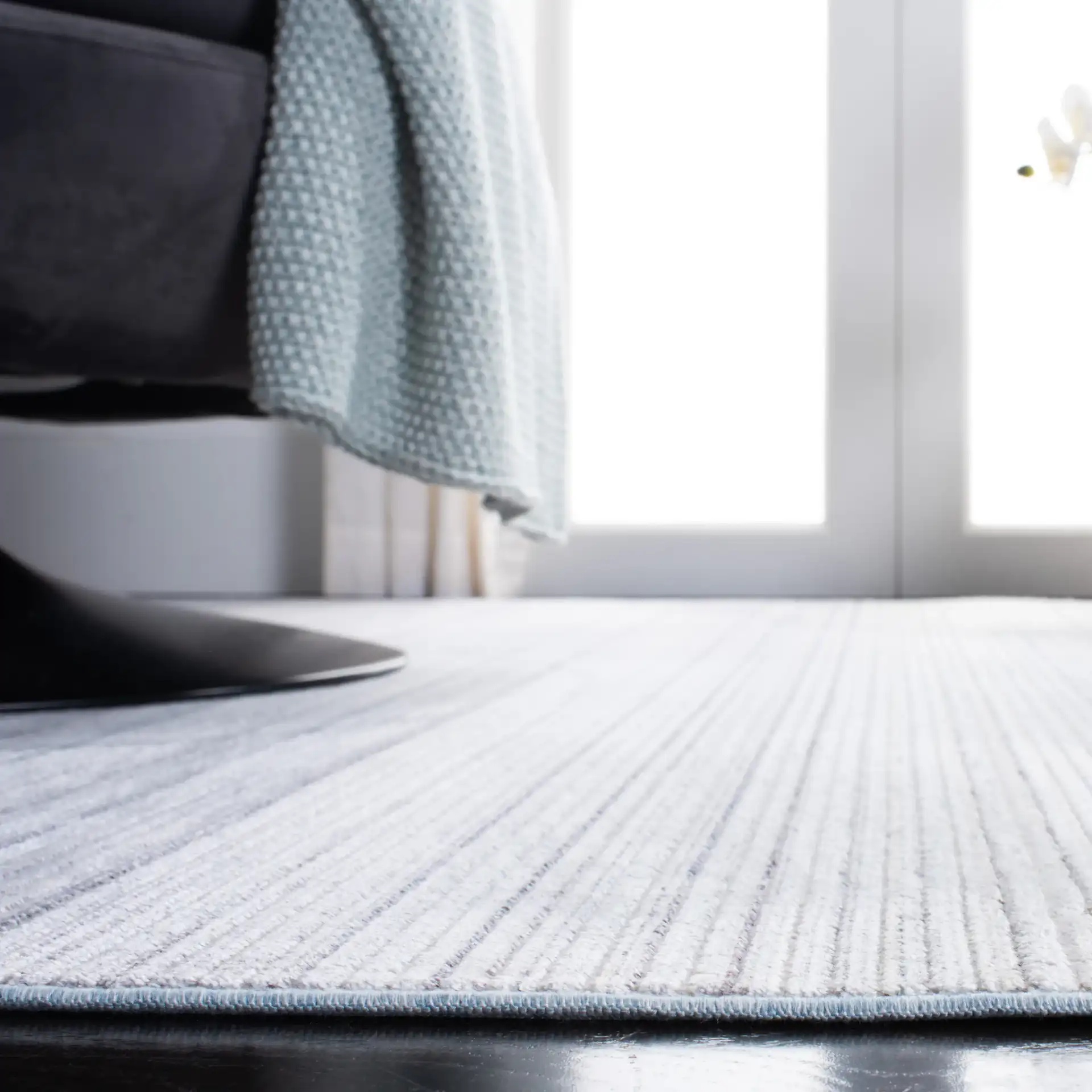 Dream Ombre Stripe Rug in Blue / Ivory in a styled room