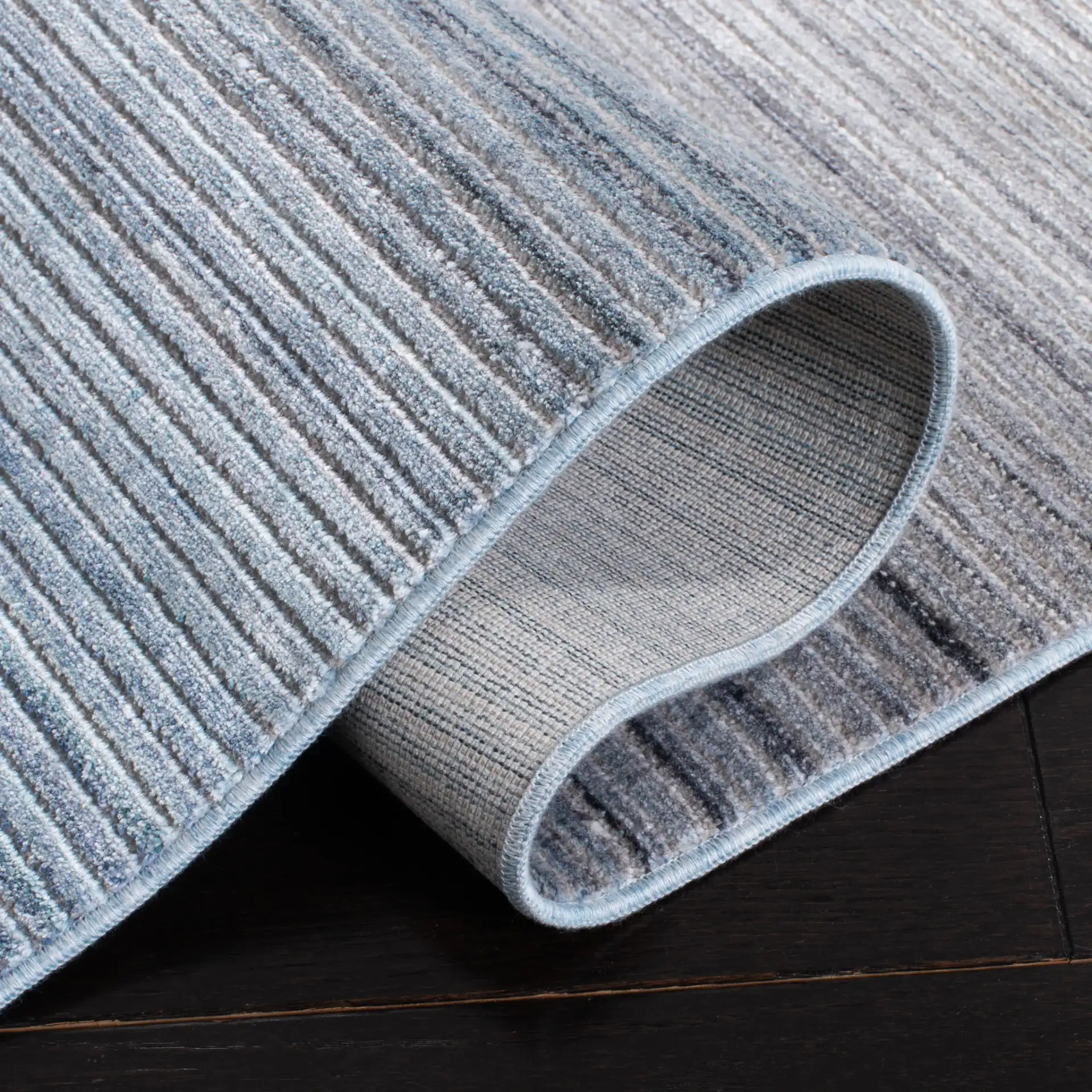 Dream Ombre Stripe Rug in Blue / Ivory in a styled room