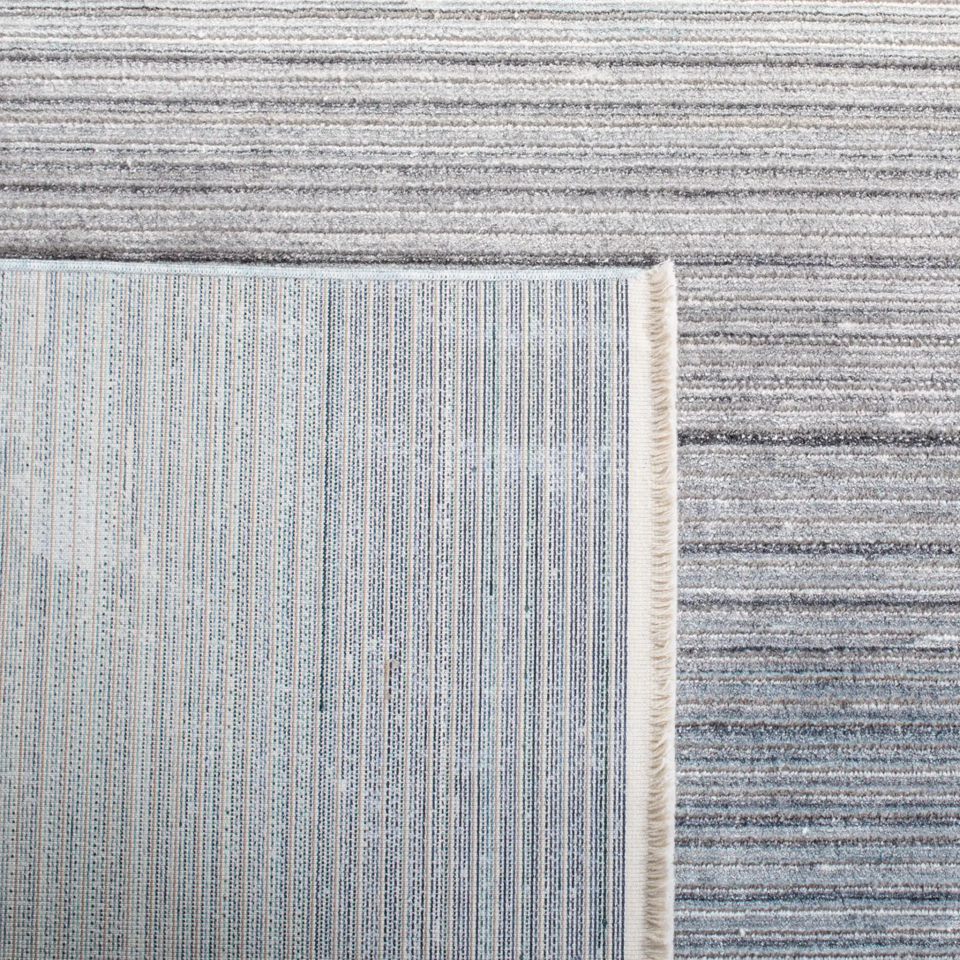 Dream Ombre Stripe Rug in Blue / Ivory in a styled room