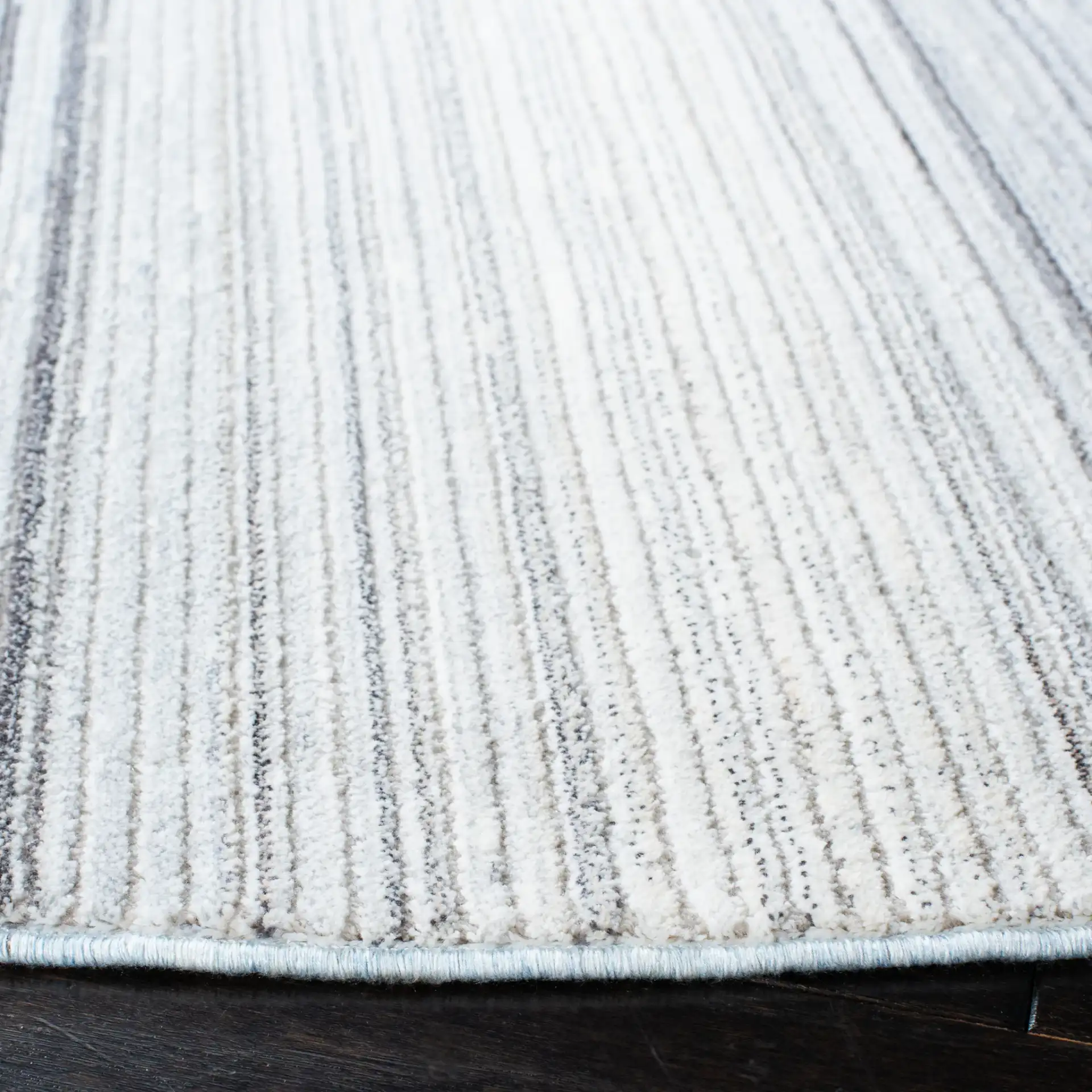Dream Ombre Stripe Rug in Blue / Ivory in a styled room