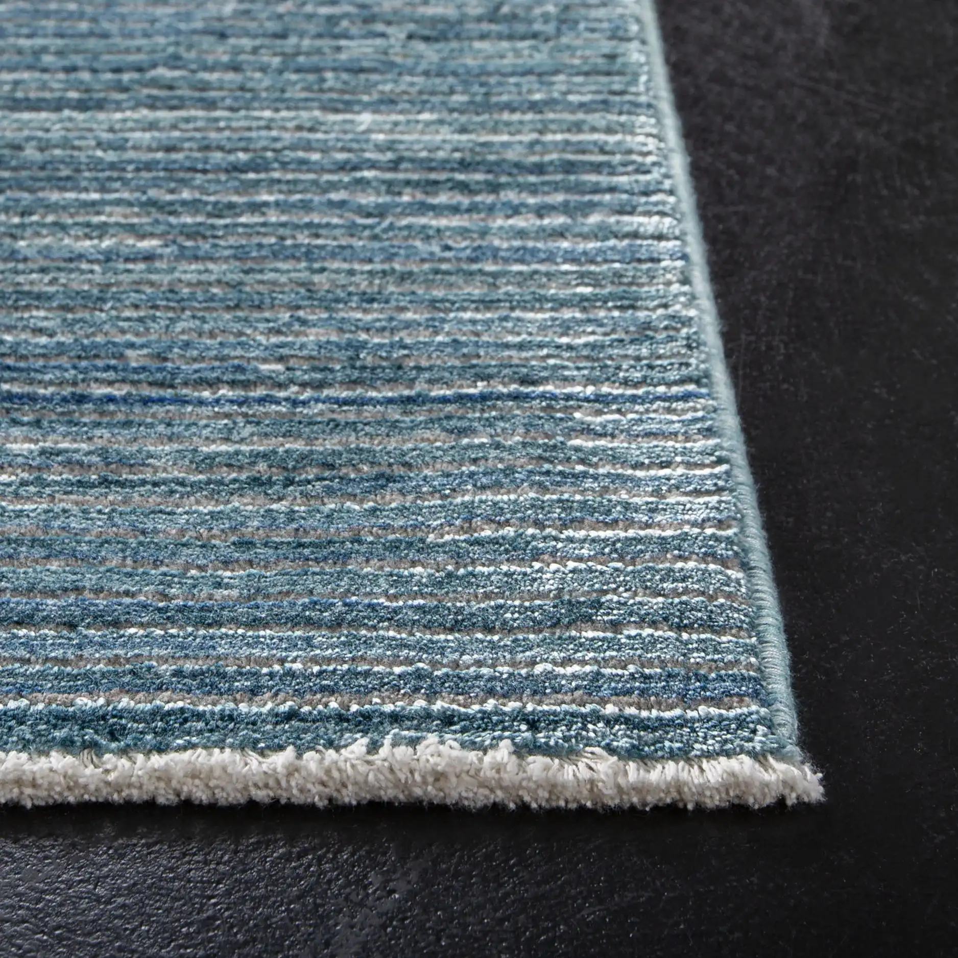 Dream Linear Stripe Rug in Blue / Gray in a styled room