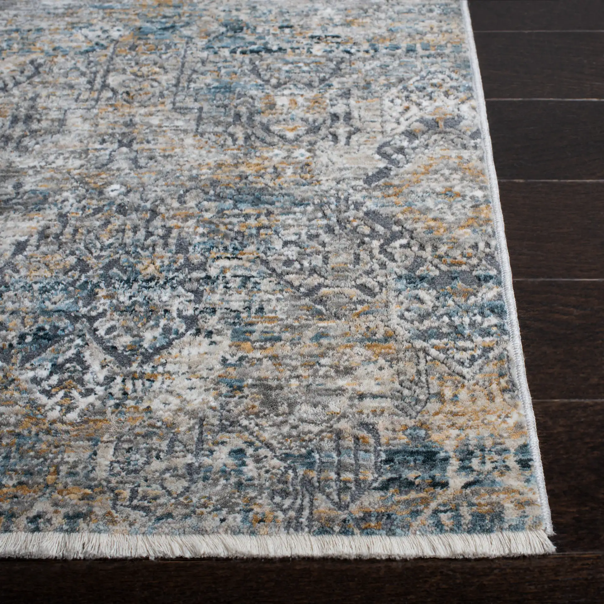 Dream Distressed Geometric Rug in Gray / Gold in a styled room