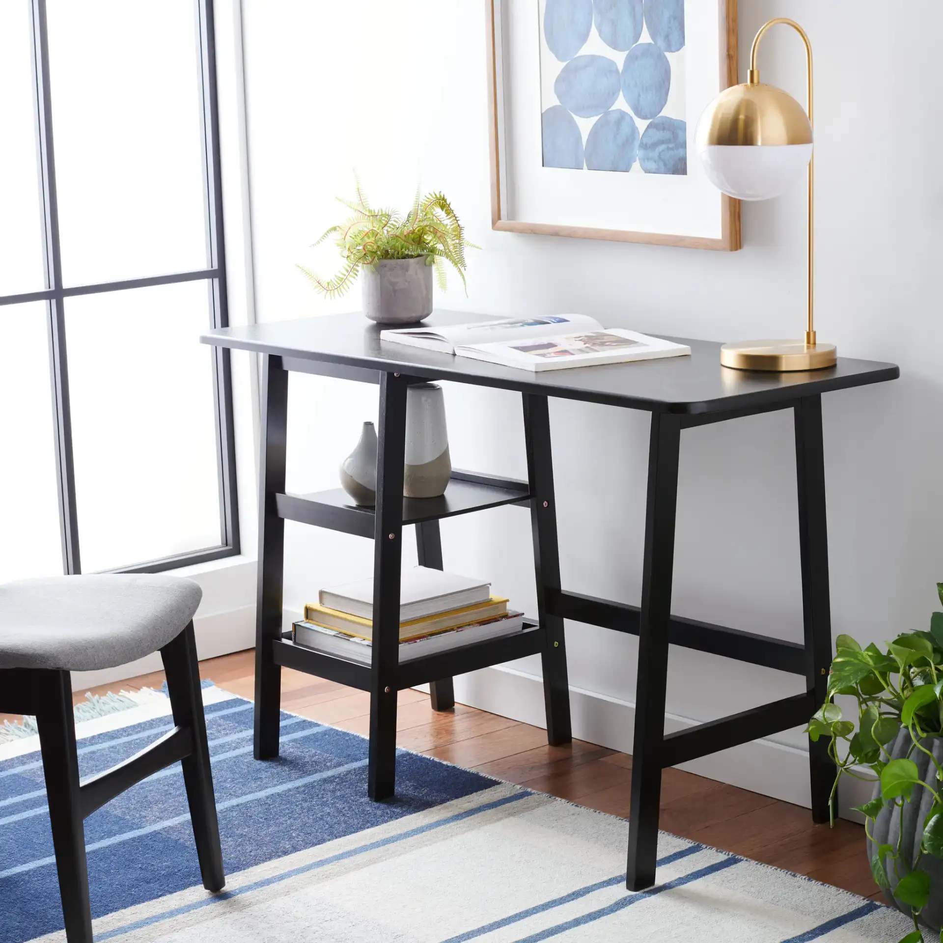 Sofara Desk in Dark Gray in a styled room