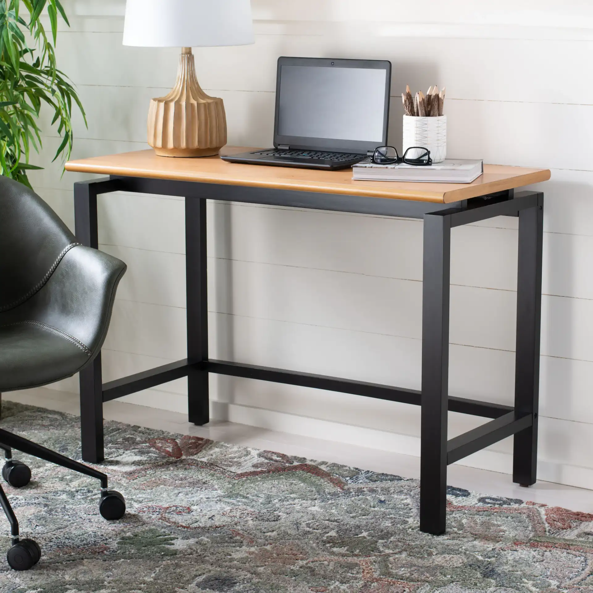 Embry Desk in Natural / Black in a styled room