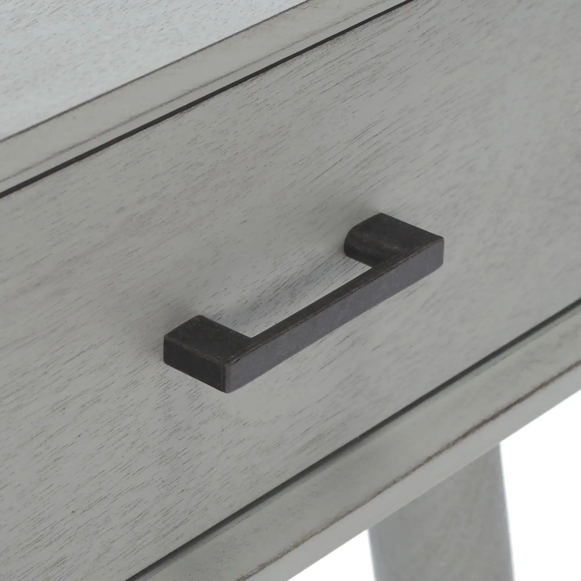 Remy One-Drawer Writing Desk in Distressed Gray in a styled room