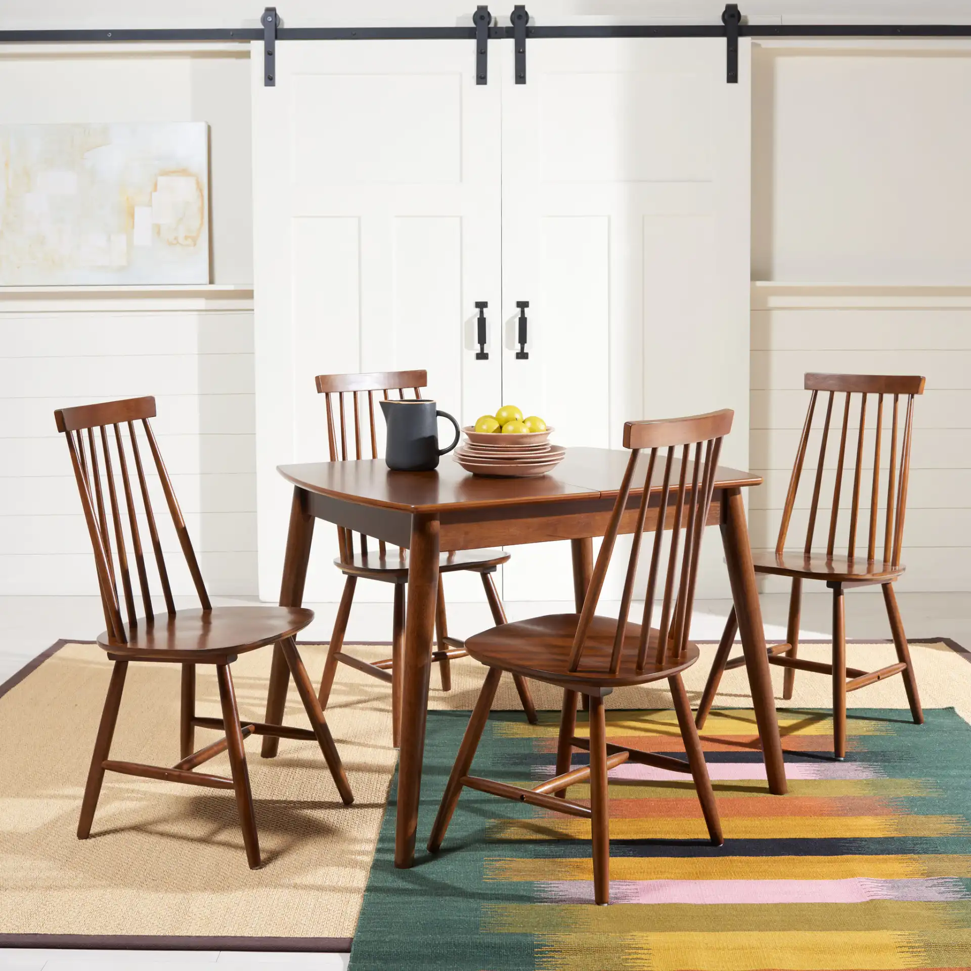 Varda Manual Extension Dining Table in Walnut in a styled room