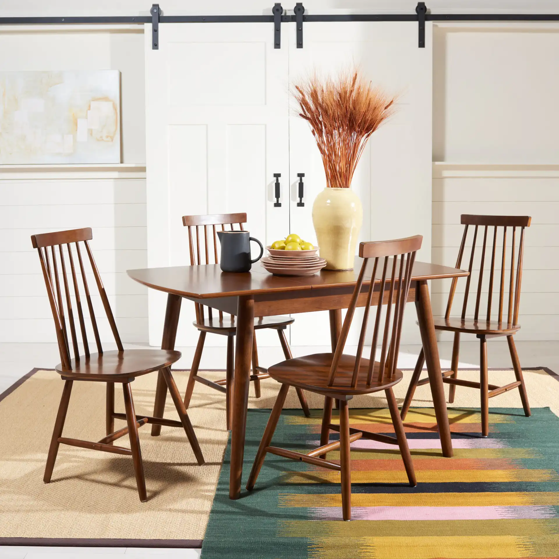 Varda Manual Extension Dining Table in Walnut in a styled room