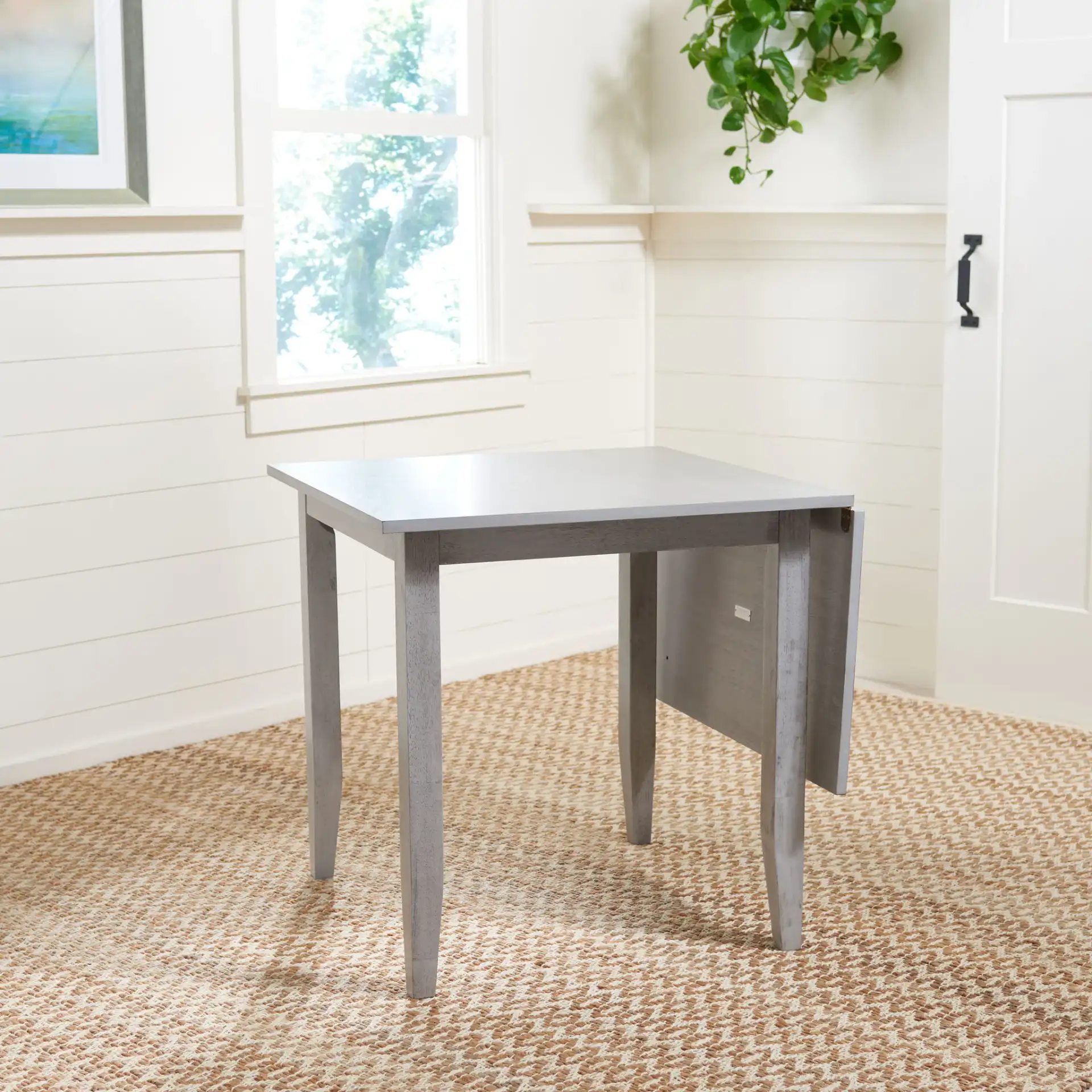 Miliano Extension Dining Table in Matte Black in a styled room