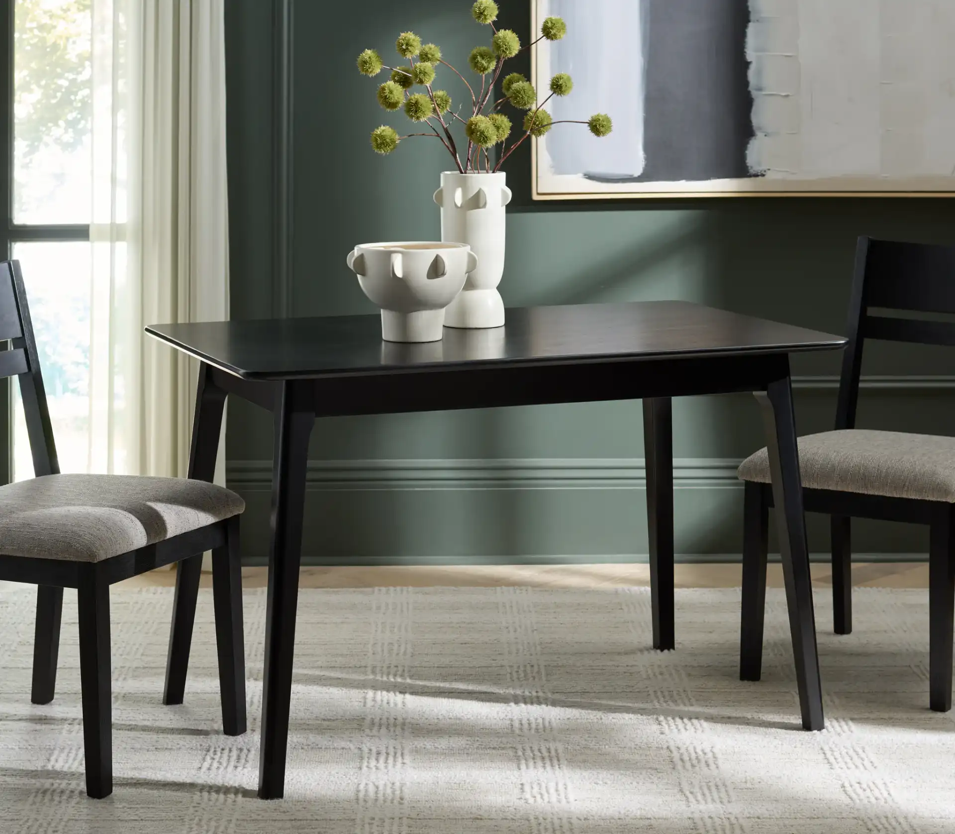 Forus Dining Table in Black in a styled room