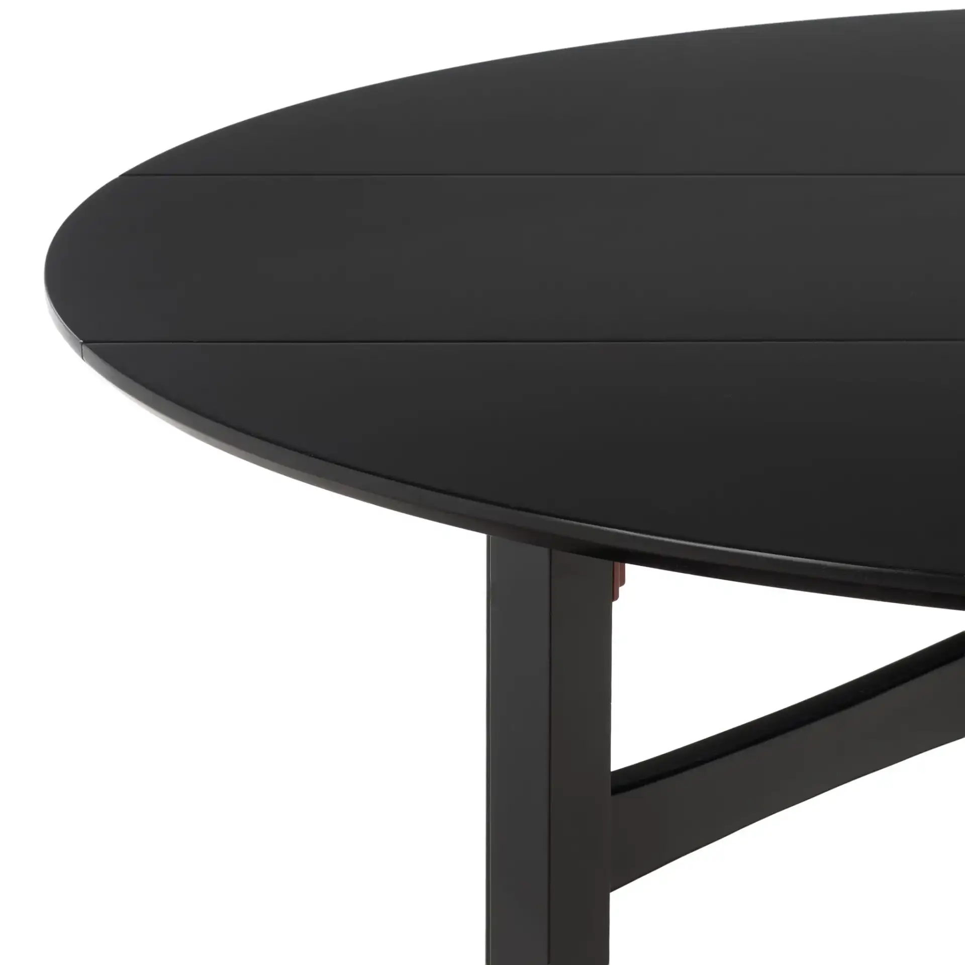 Roz Folding Round Dining Table in Black in a styled room