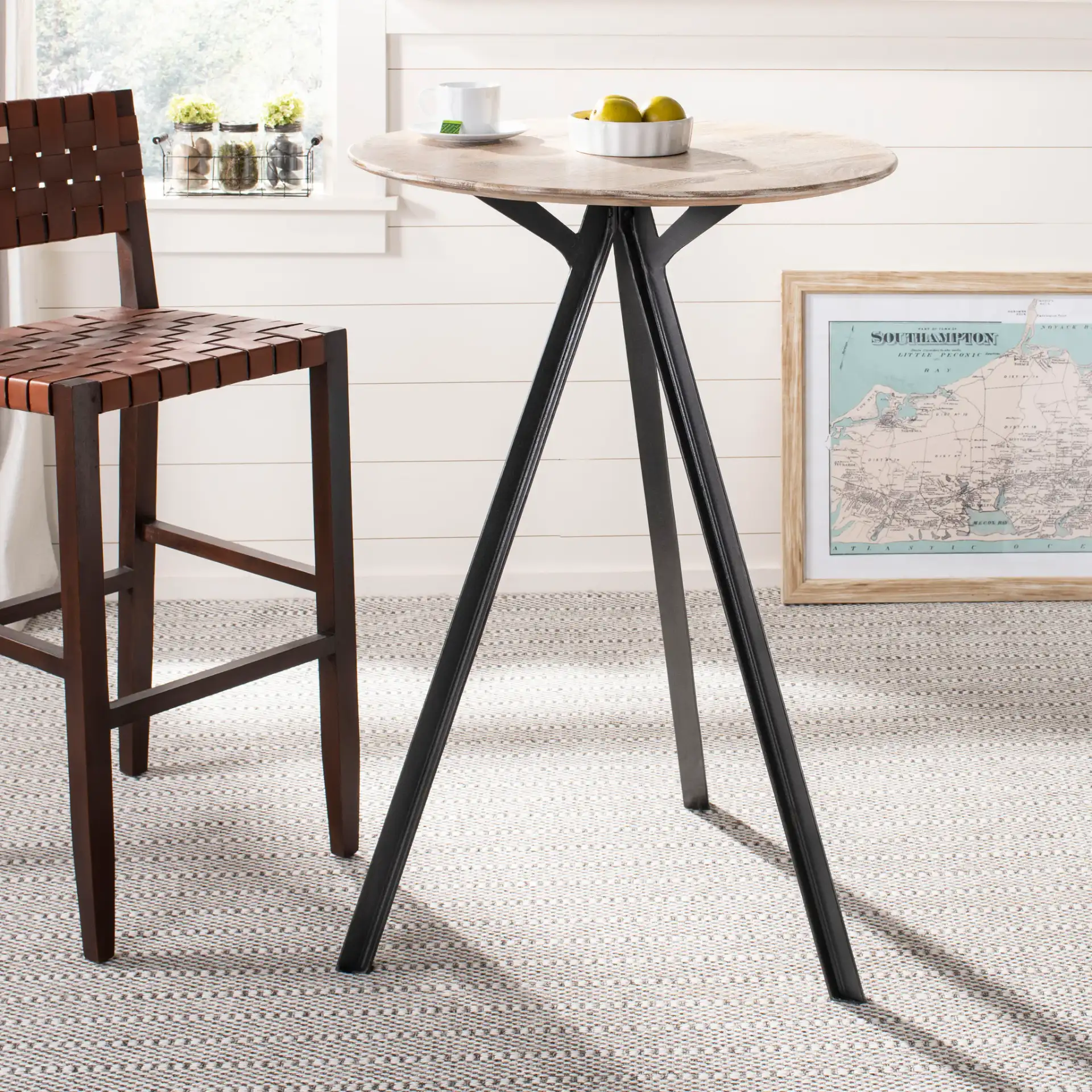 Axel Tripod Pub Table in Gray Washed / Black in a styled room