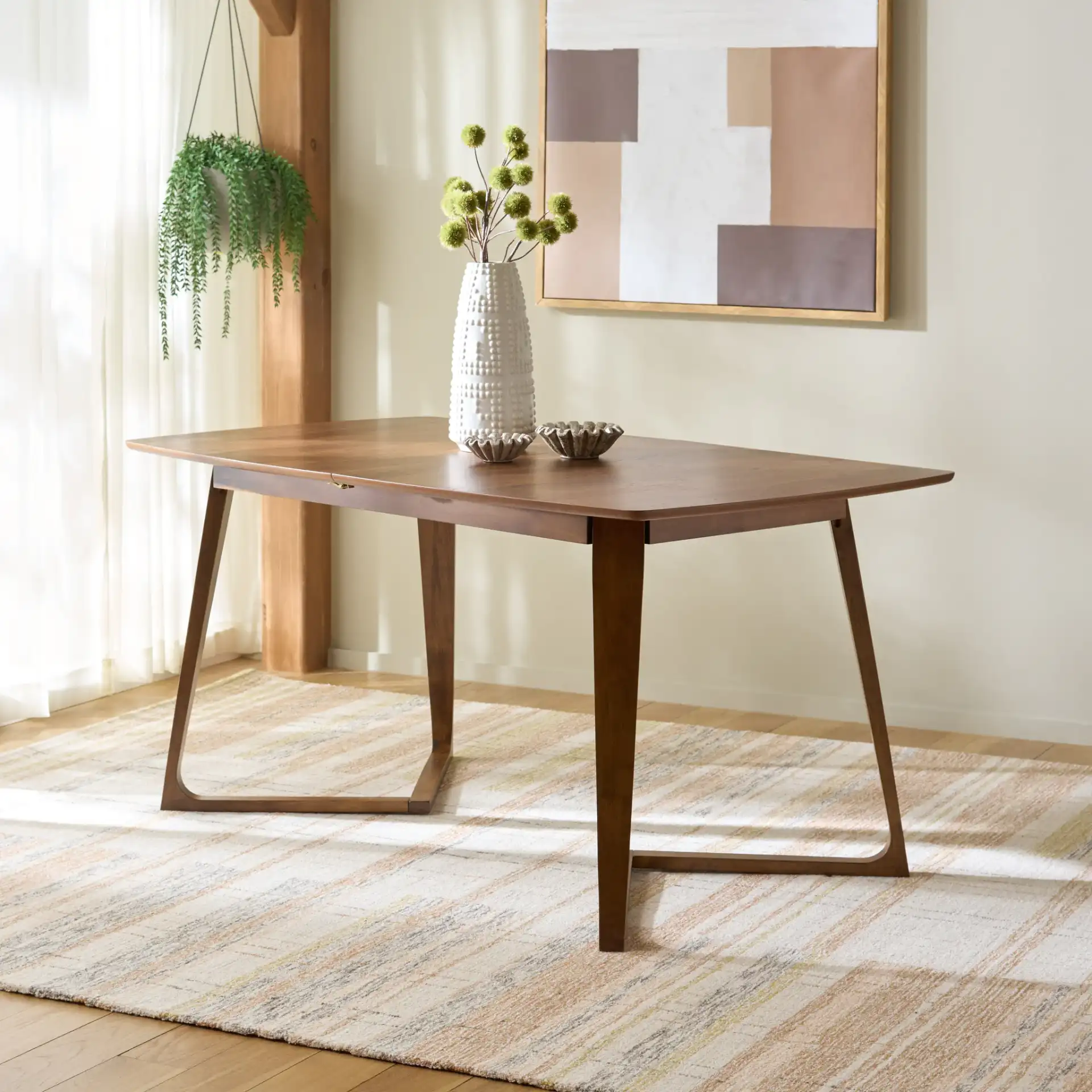 Alissa Extendable Dining Table in Walnut in a styled room