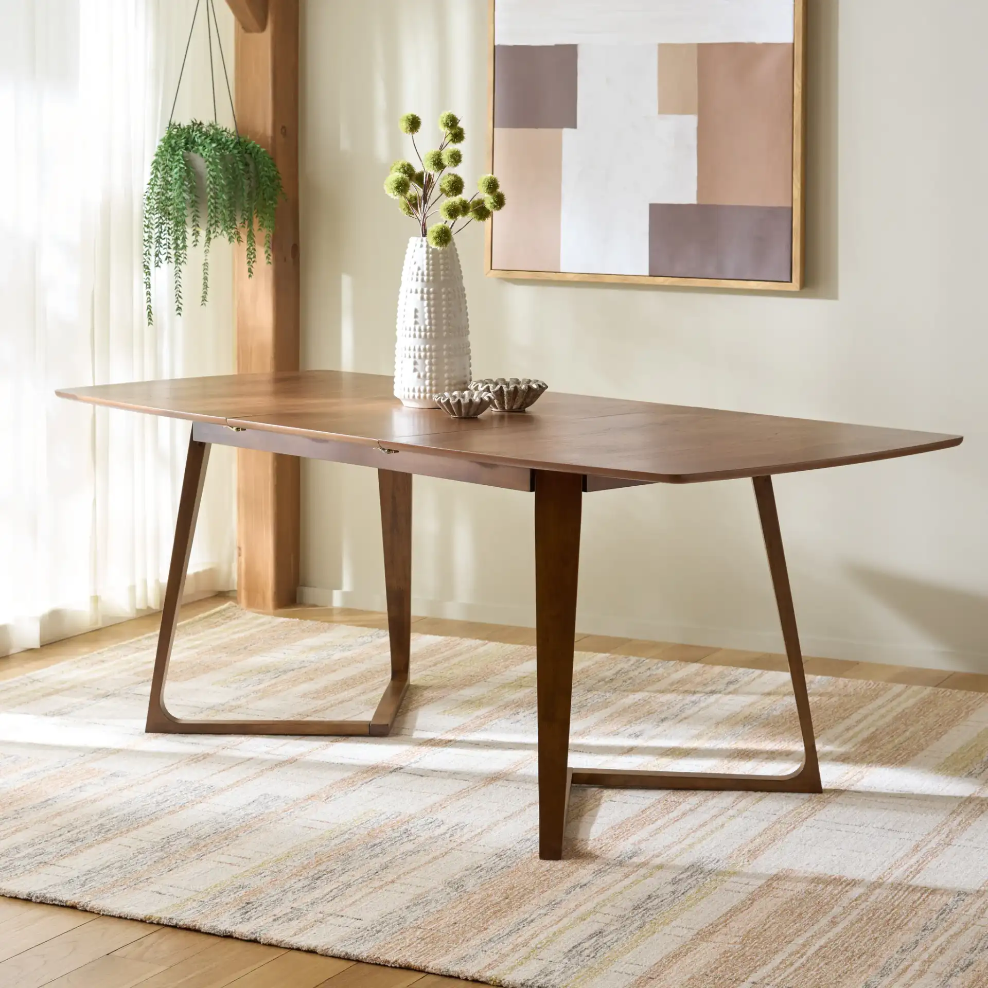 Alissa Extendable Dining Table in Walnut in a styled room