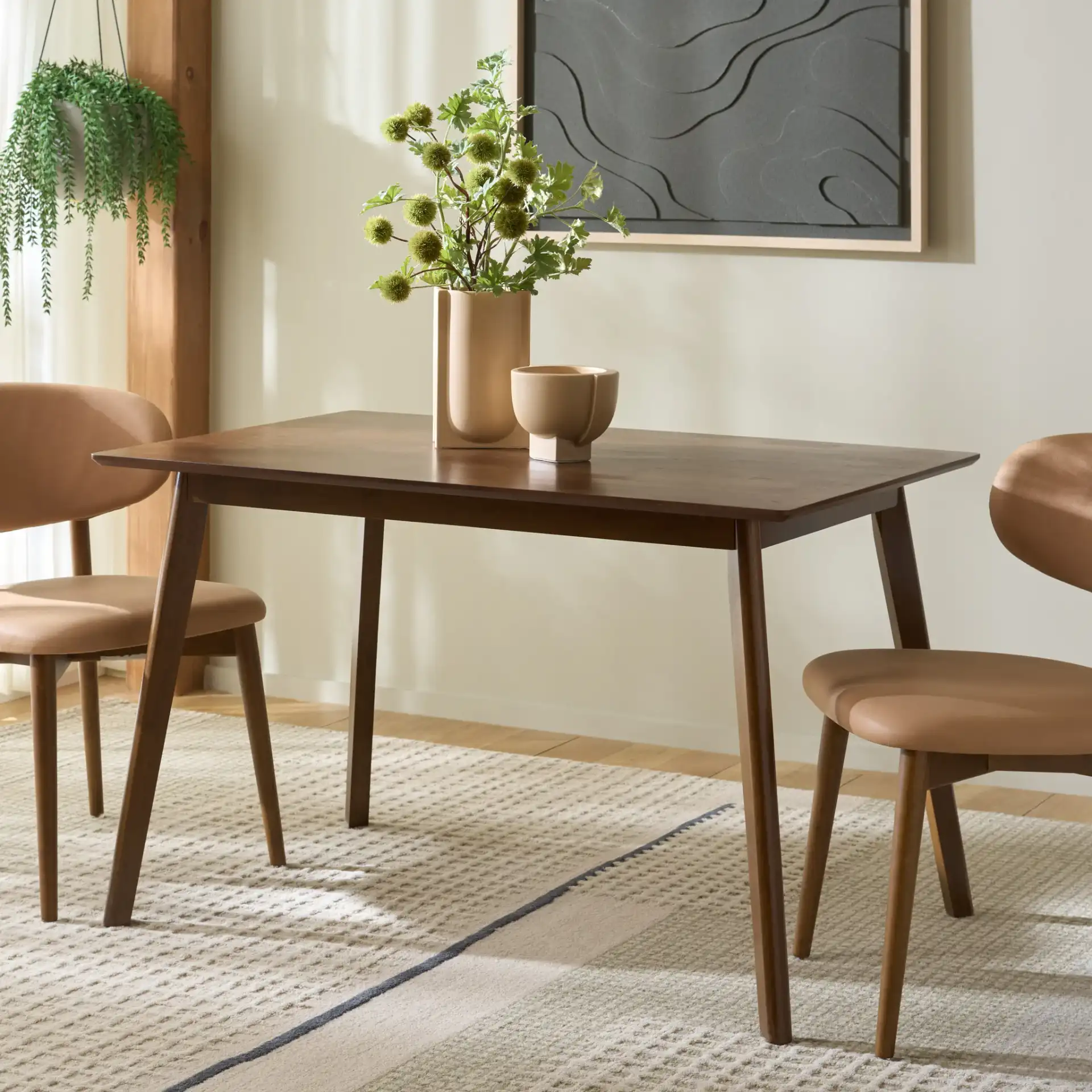 Amelin Dining Table in Walnut in a styled room
