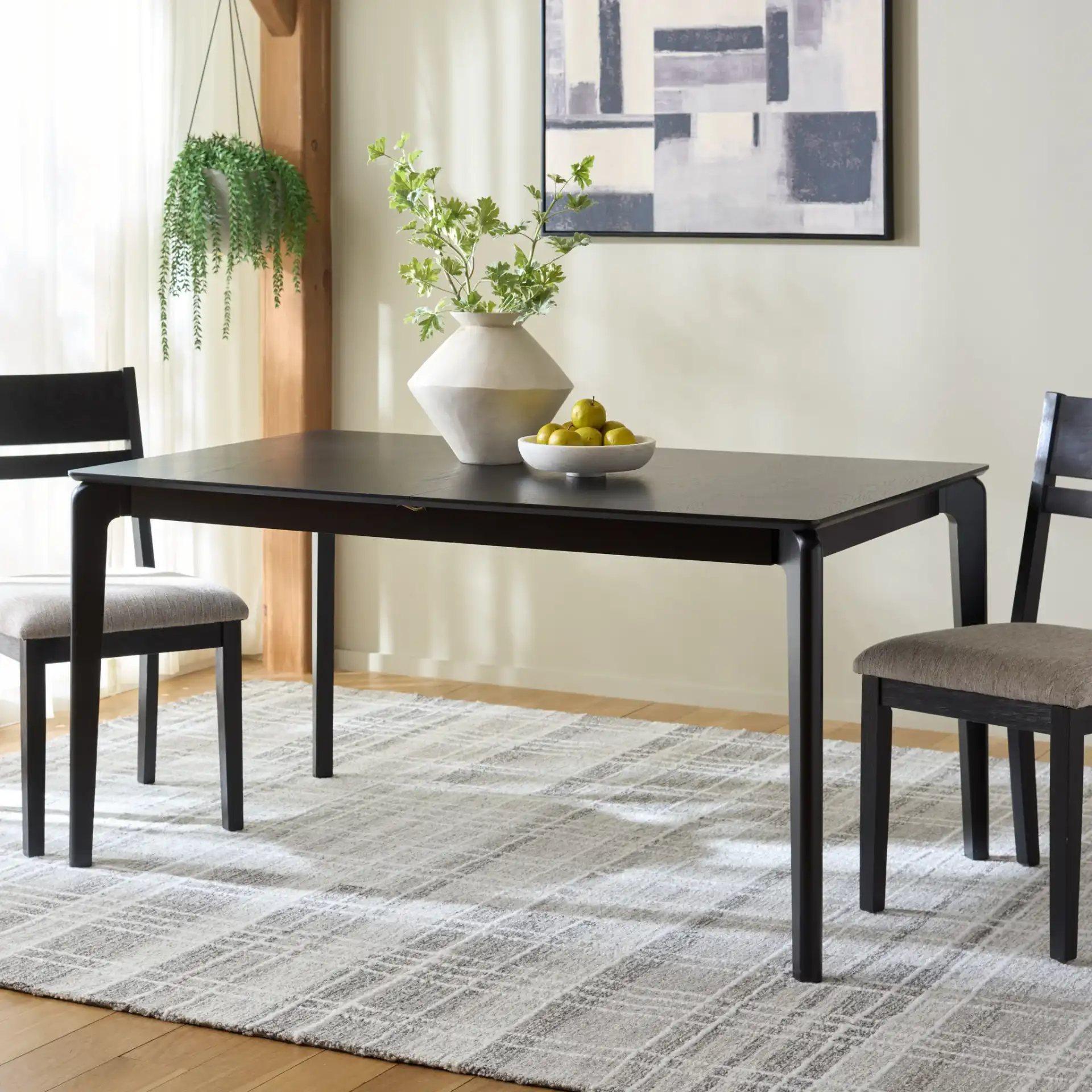 Hammis Extendable Dining Table in Black in a styled room