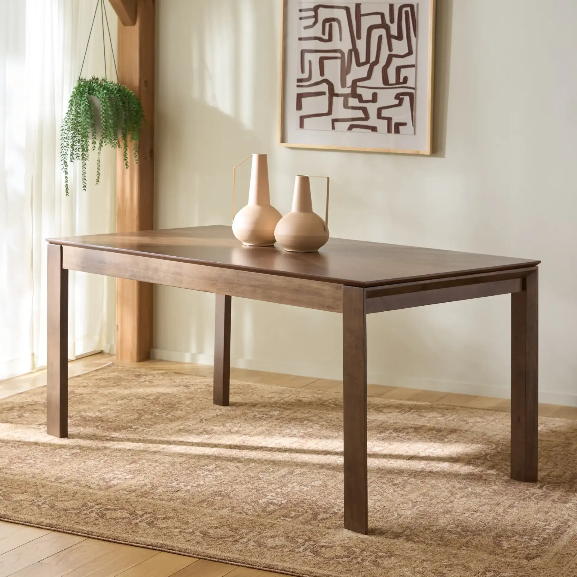 Melo Dining Table in Walnut in a styled room
