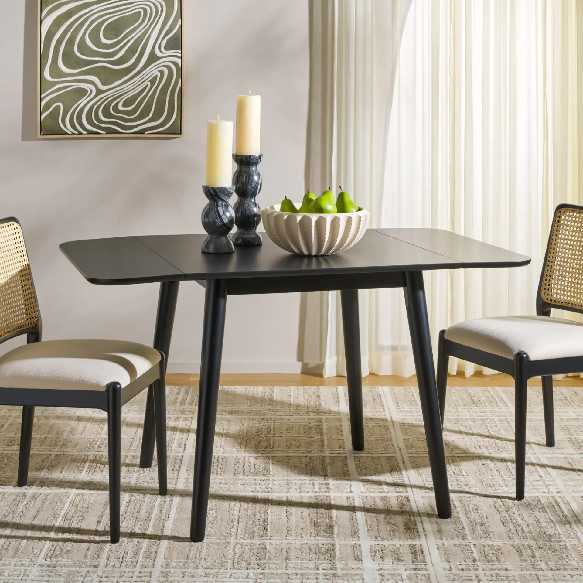 Damarius Drop Leaf Table in Matte Black in a styled room