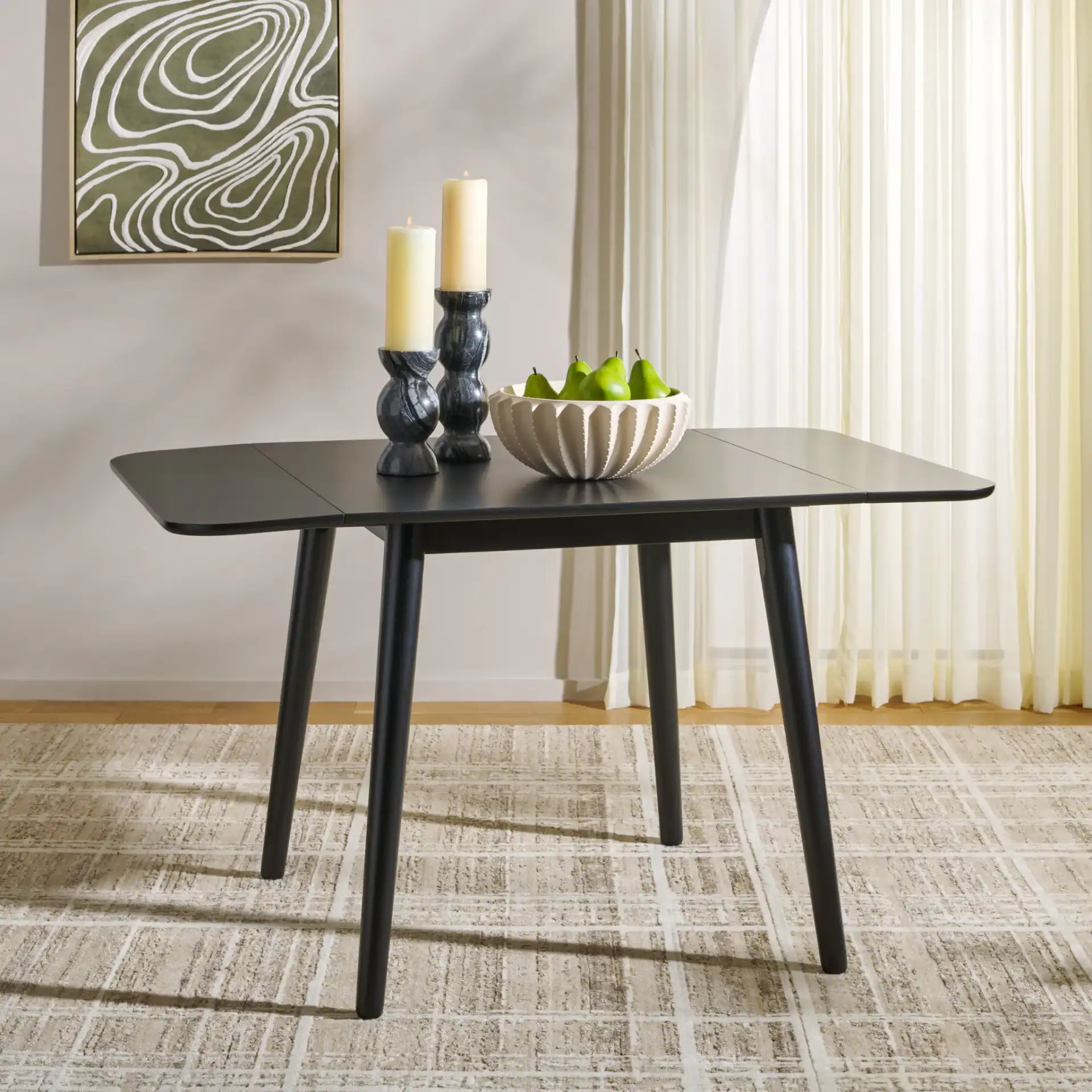 Damarius Drop Leaf Table in Matte Black in a styled room