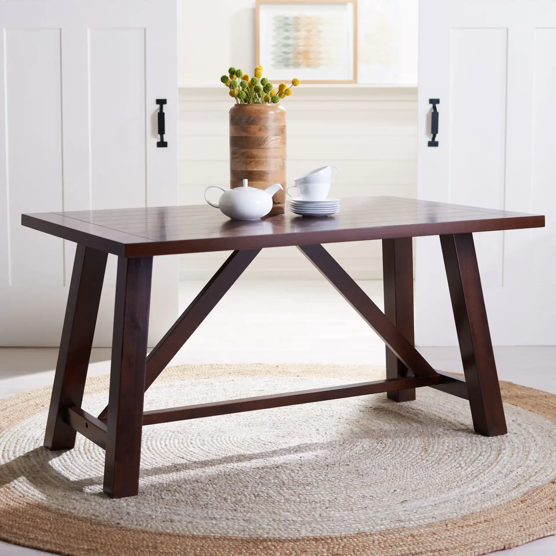Ainslee Rectangle Dining Table in Brown in a styled room