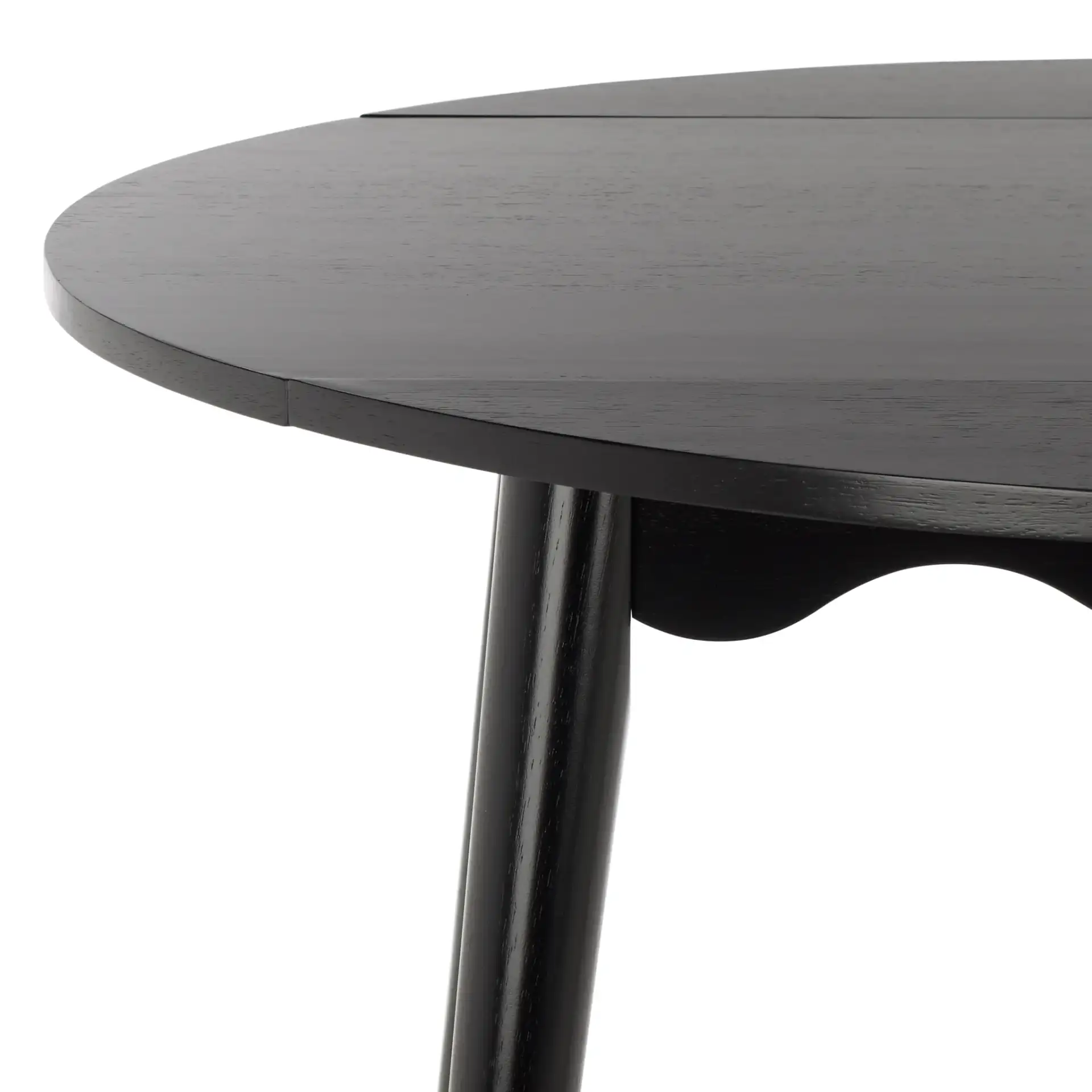 Roma Round Drop Leaf Scallop Table in Black in a styled room