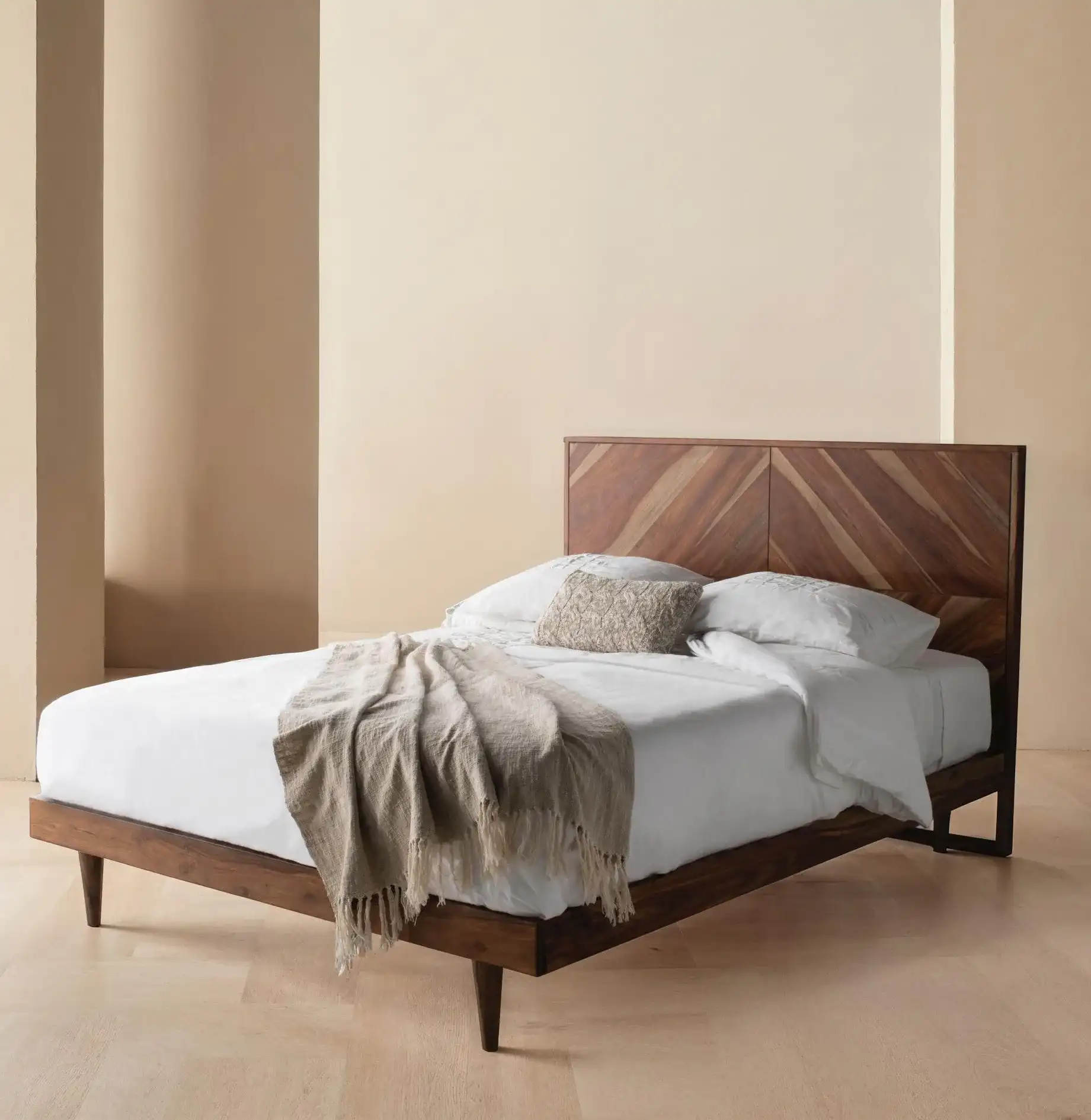 Macibryn Wood Herringbone Bed in Natural in a styled room