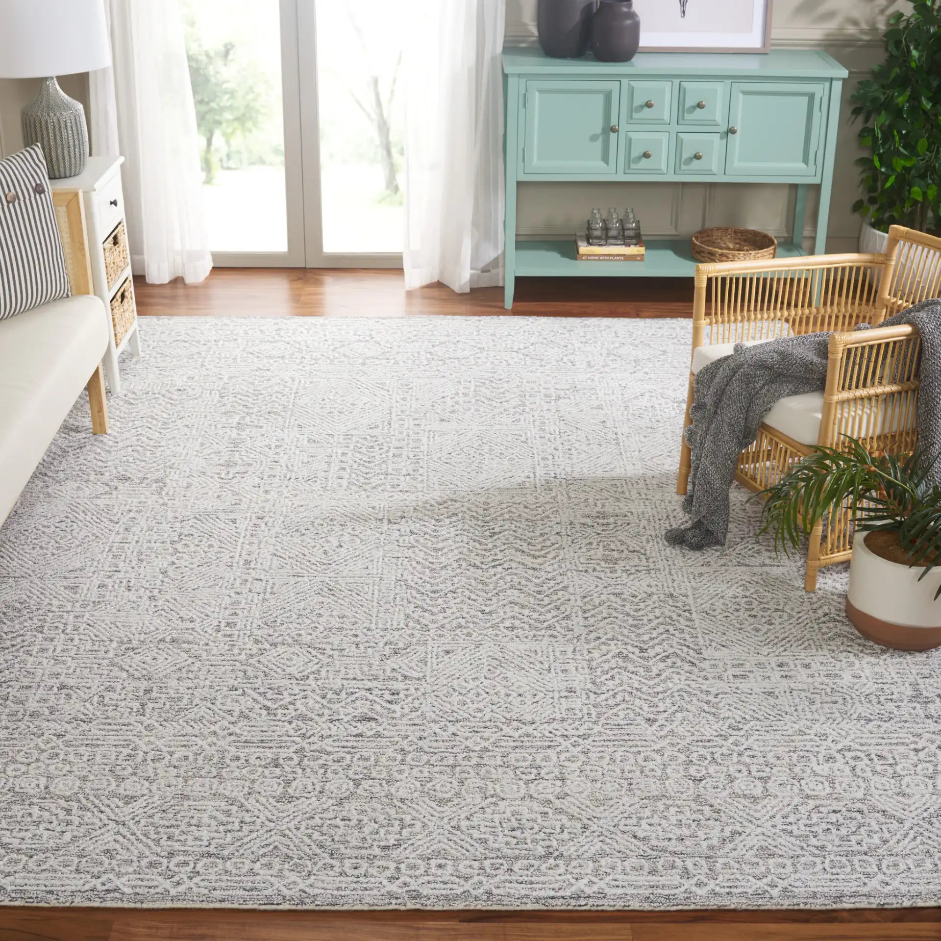 Ebony Patchwork Hand-Tufted Rug in Gray / Ivory in a styled room