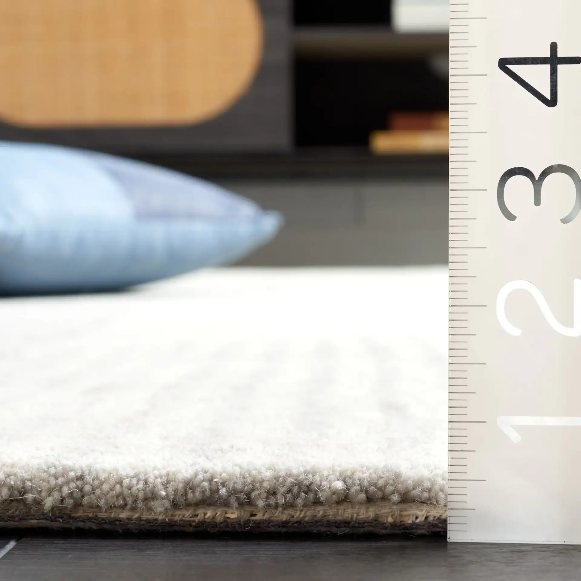Ebony Linear Block Hand-Tufted Rug in Beige / Gray in a styled room