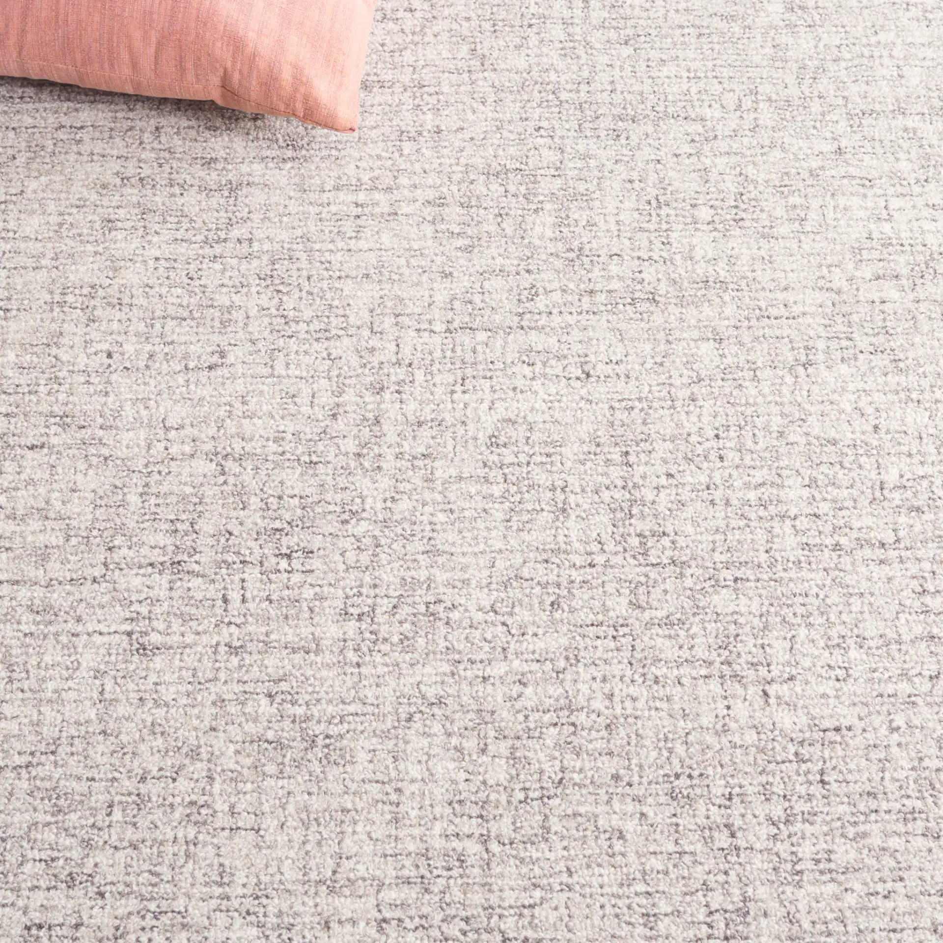 Ebony Bordered Hand-Tufted Wool Rug in Gray in a styled room