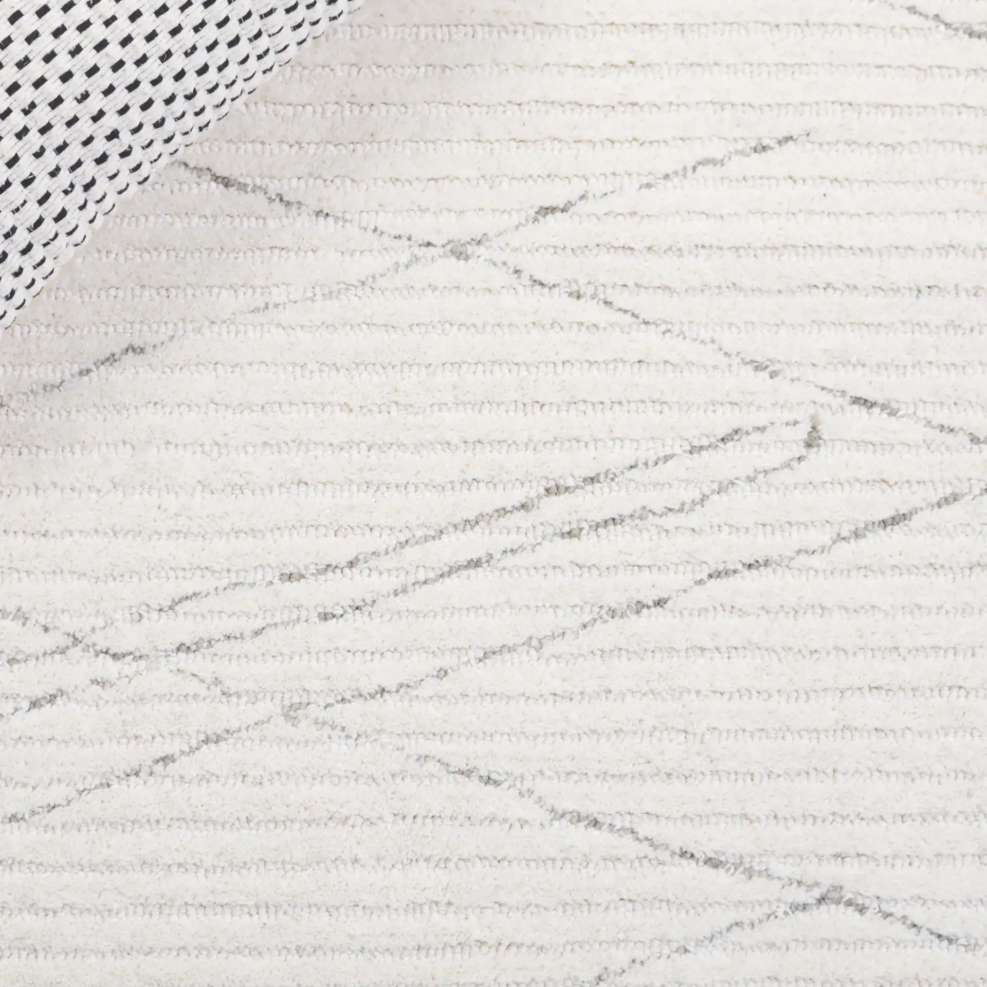 Ebony Linear Hand-Tufted Wool Rug in Ivory / Gray in a styled room