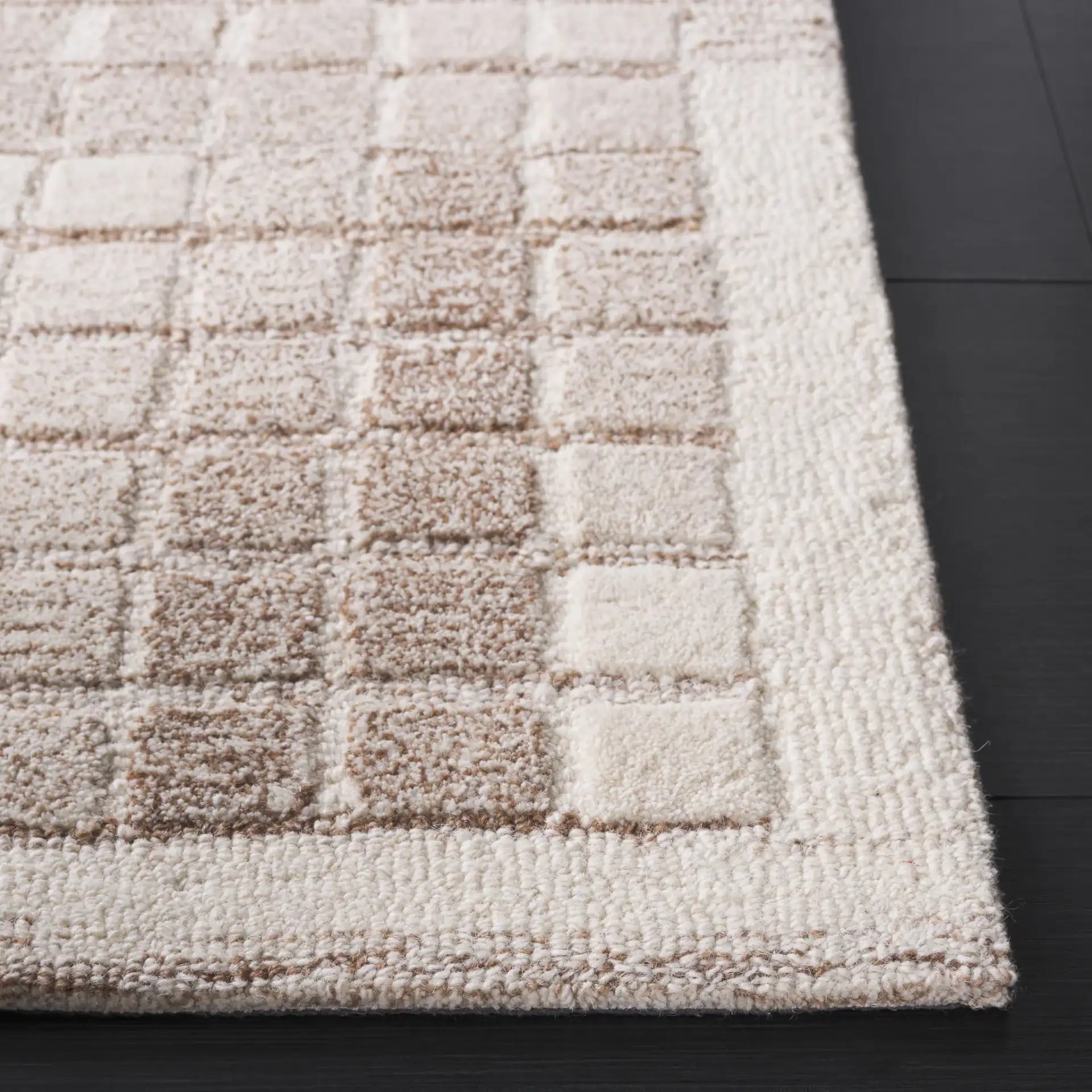 Ebony Mosaic Hand-Tufted Wool Rug in Ivory / Brown in a styled room