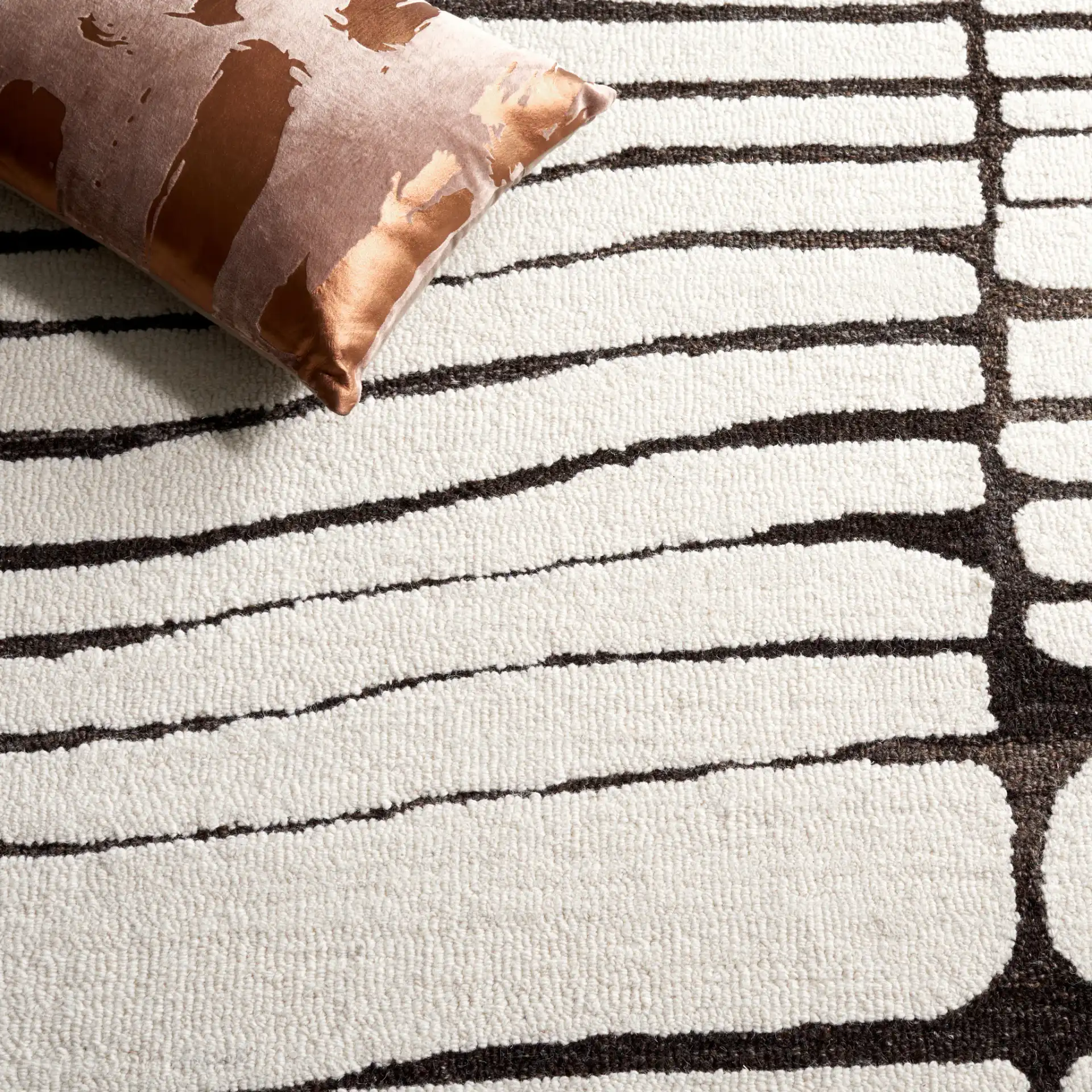 Ebony Linear Grid Hand-Tufted Wool Rug in Ivory / Dark Brown in a styled room