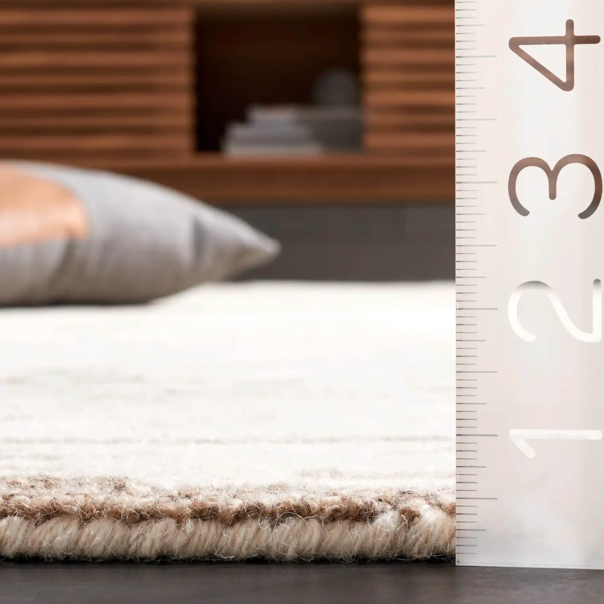 Ebony Linear Abstract Hand-Tufted Wool Rug in Ivory / Gray in a styled room