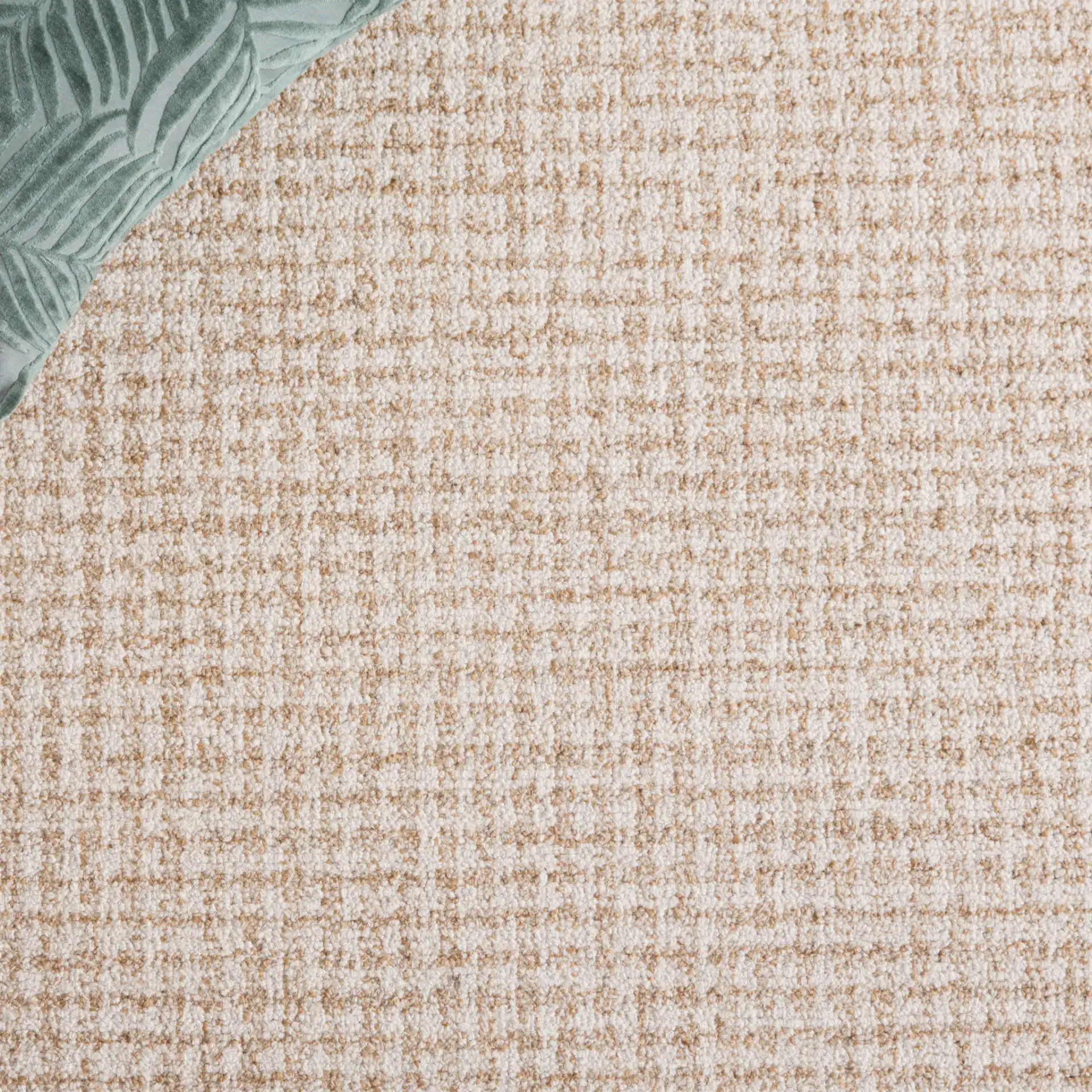 Ebony Waffle Grid Hand-Tufted Rug in Beige / Gold in a styled room