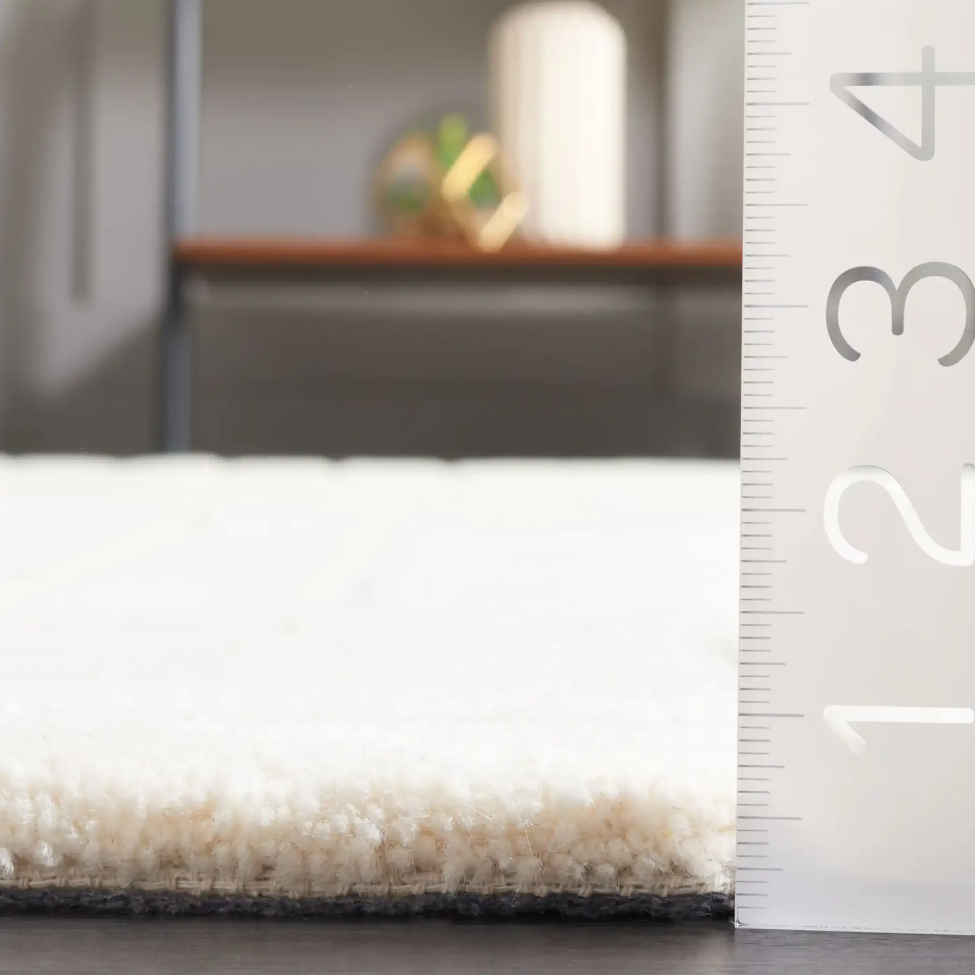 Ebony Linear Geometric Hand-Tufted Wool Rug in Ivory in a styled room