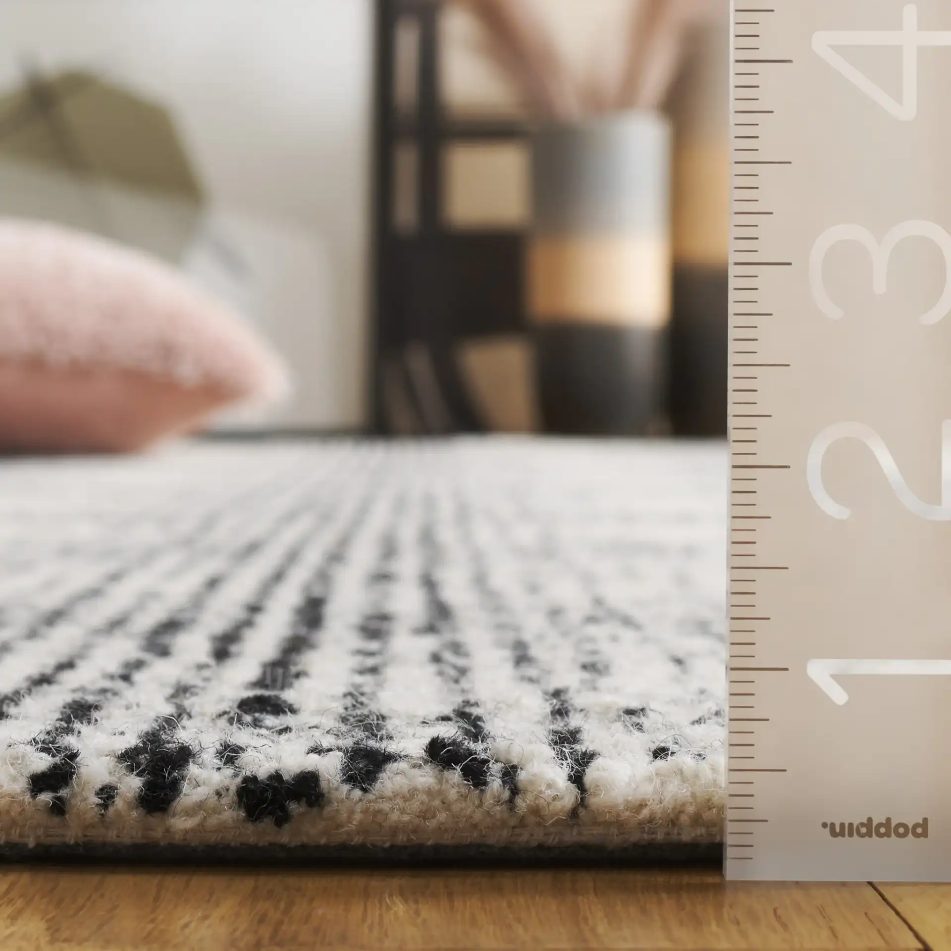 Ebony Gingham Plaid Hand-Tufted Wool Rug in Ivory / Black in a styled room
