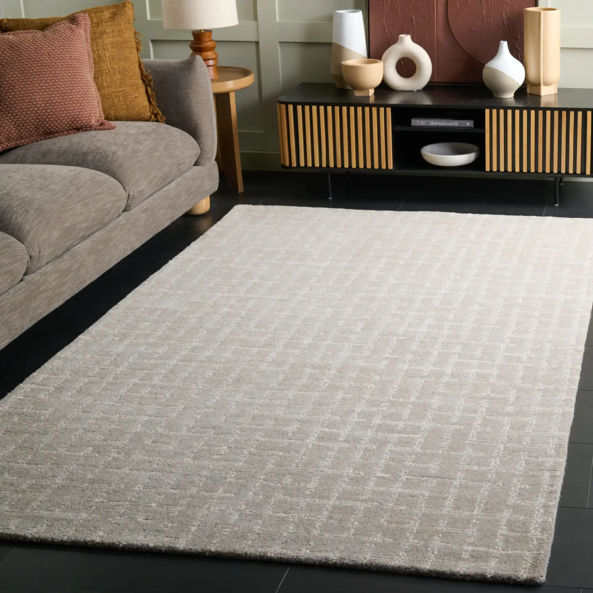 Ebony Intersecting Grid Hand-Tufted Wool Rug in Gray in a styled room
