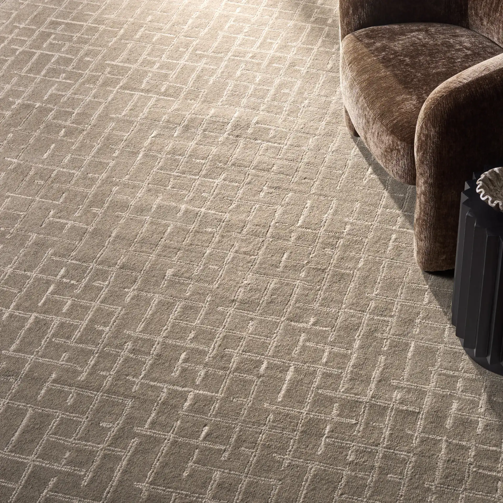 Ebony Intersecting Grid Hand-Tufted Wool Rug in Gray in a styled room