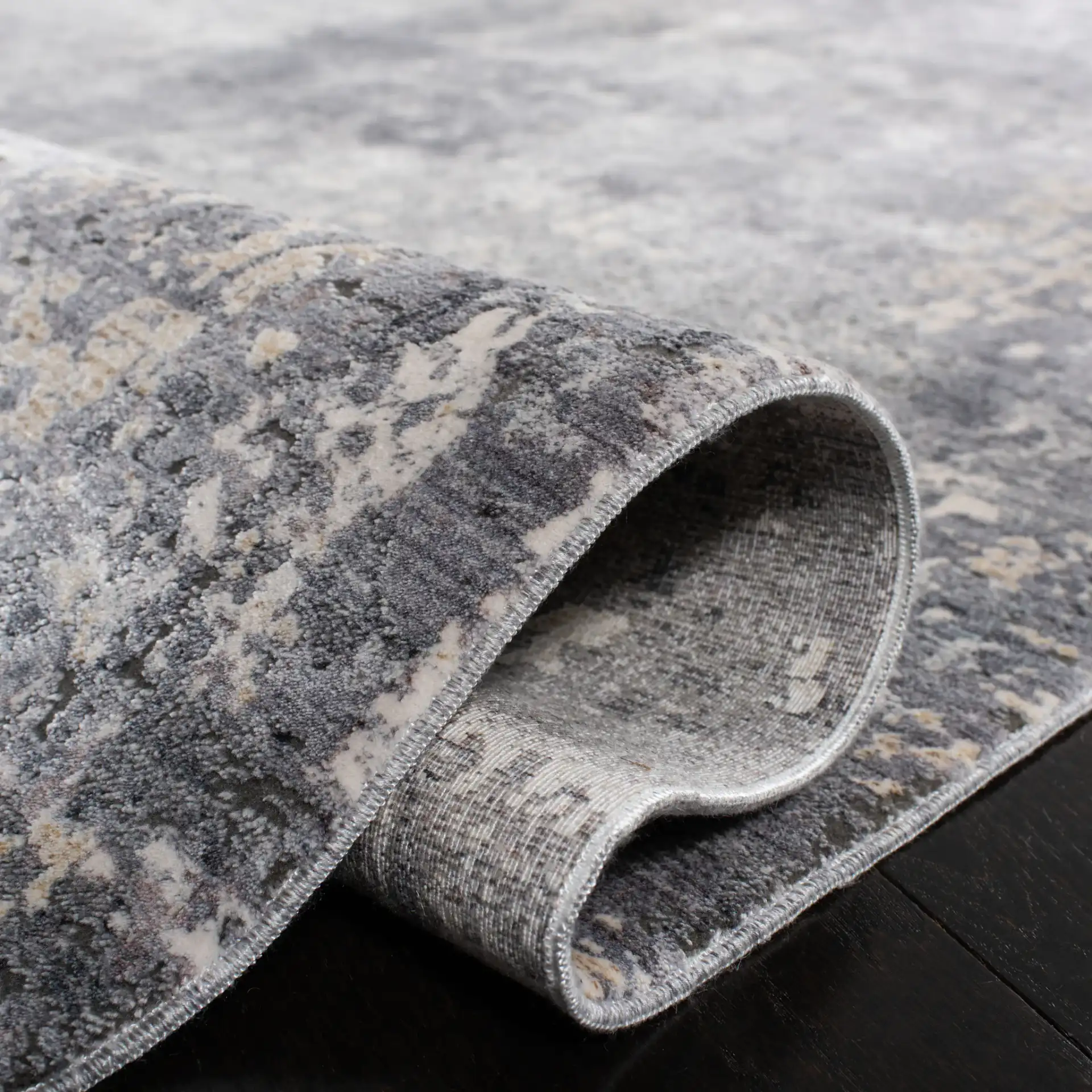 Eclipse Distressed Abstract Rug in Gray / Beige in a styled room